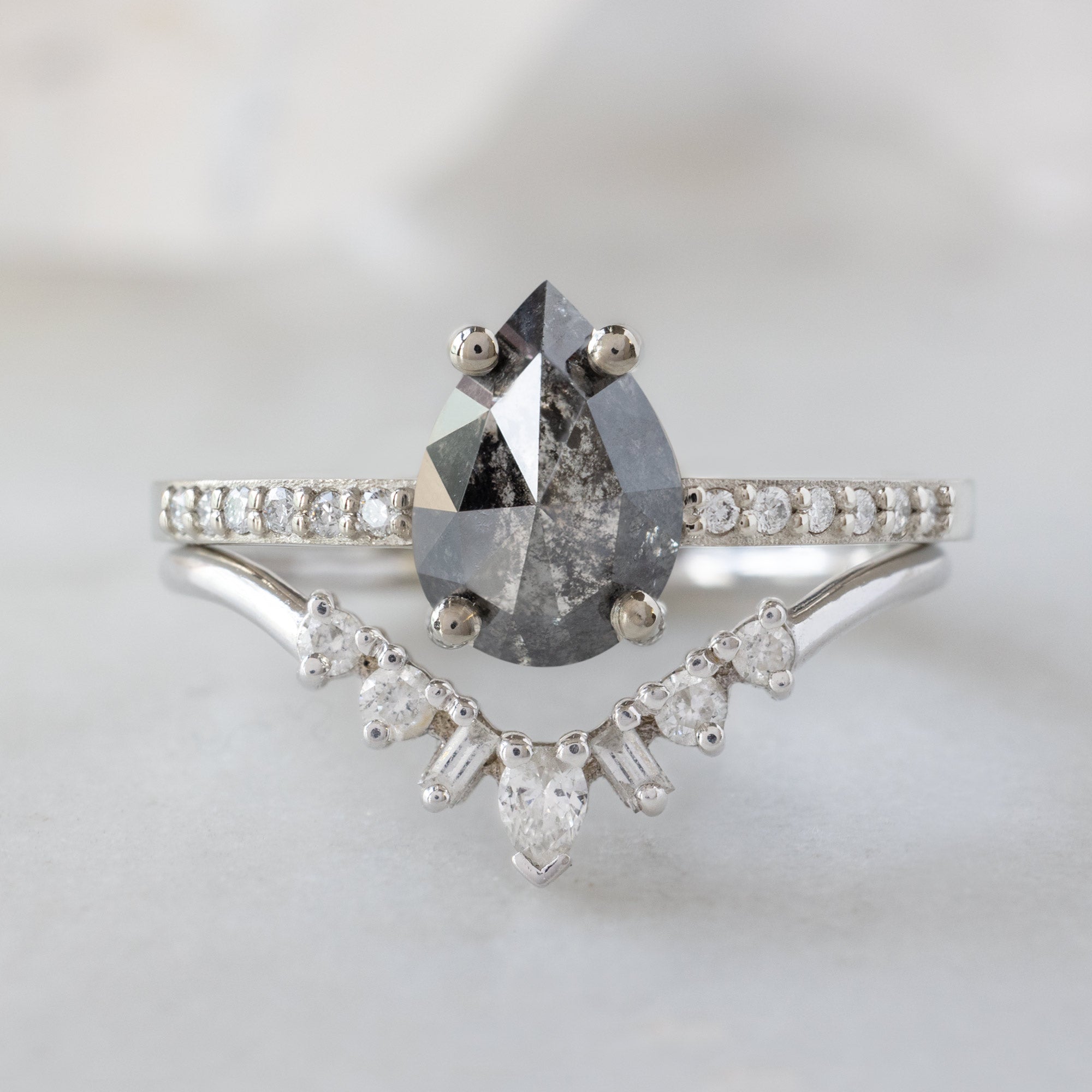 The Willow Ring with a 1.32ct Pear Salt and Pepper Diamond in 14K White Gold with Geometric White Diamond Sunburst Stacking Band