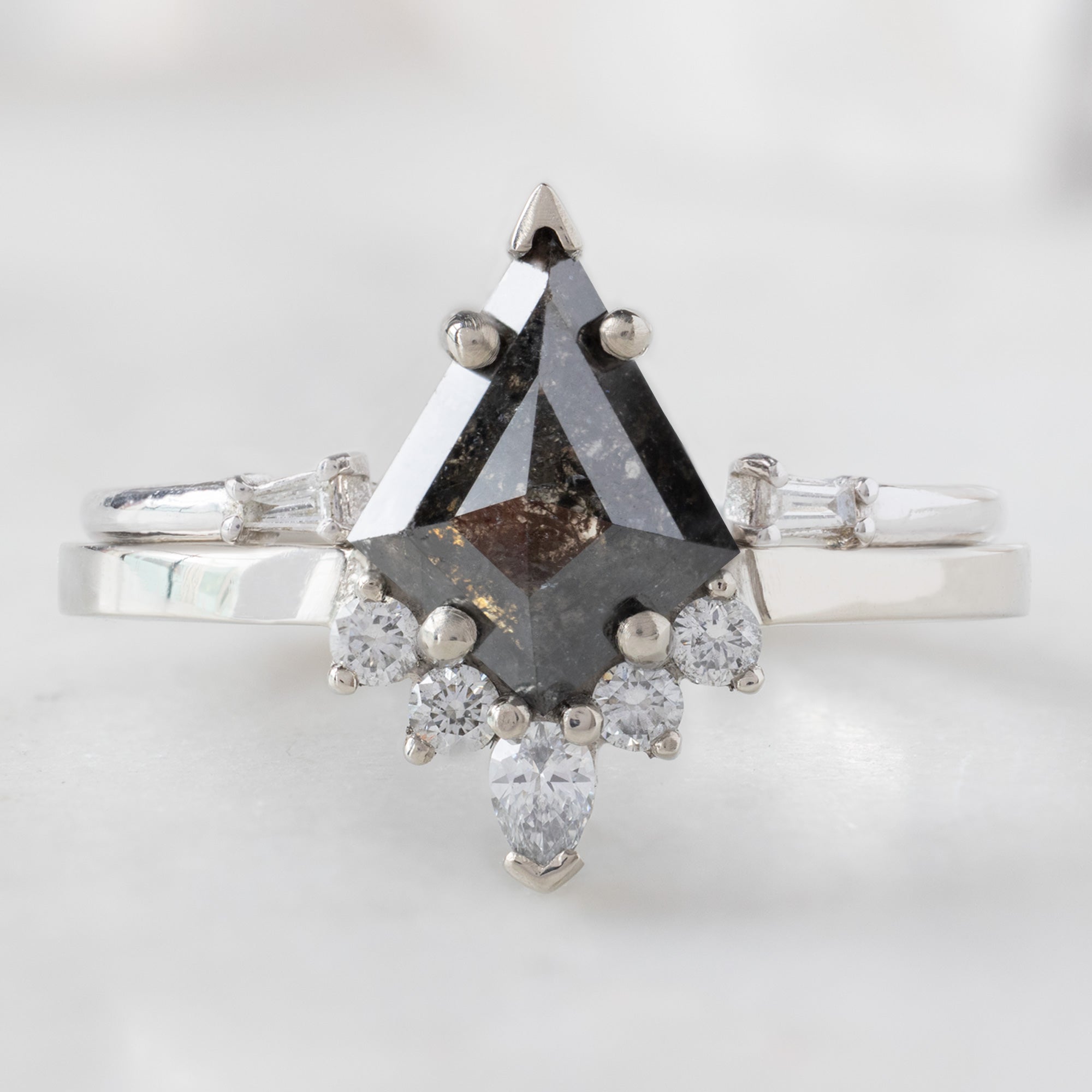 The Aster Ring with a 0.94ct Kite Black Diamond in 14K White Gold with Open Cuff Baguette Diamond Stacking Ring