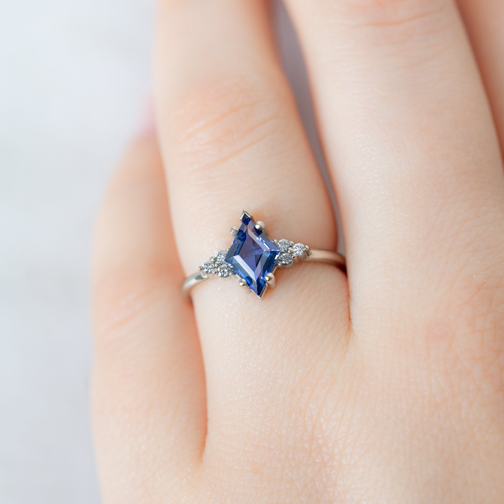 The Ivy Ring with a 1.04ct Kite Blue Sapphire in 14K White Gold on Model