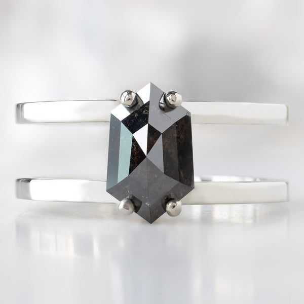 The Poppy Ring with a 1.56ct Hexagon Black Diamond in 14K White Gold on White Marble