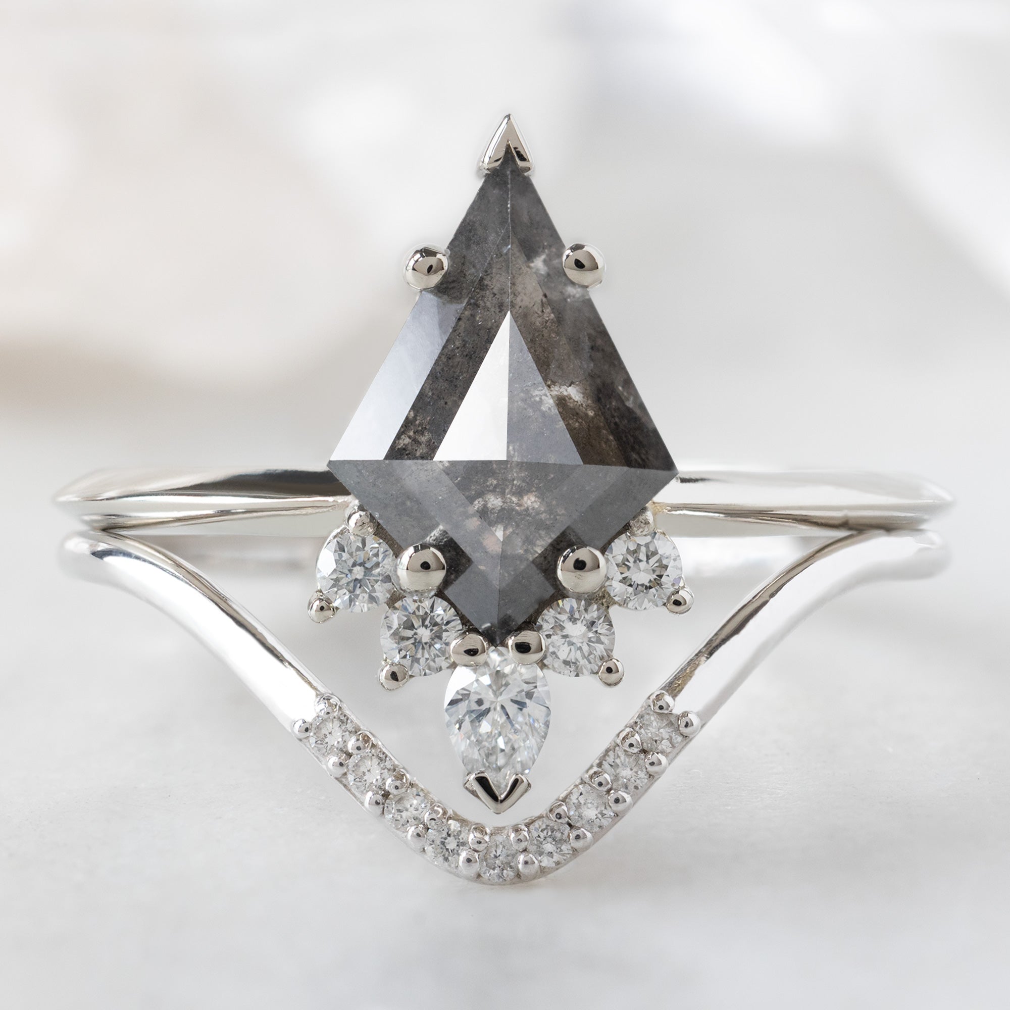 The Aster Ring with a 1.27ct Kite Black Diamond in 14K White Gold Stacked with the White Diamond Pavé Peak Stacking Band