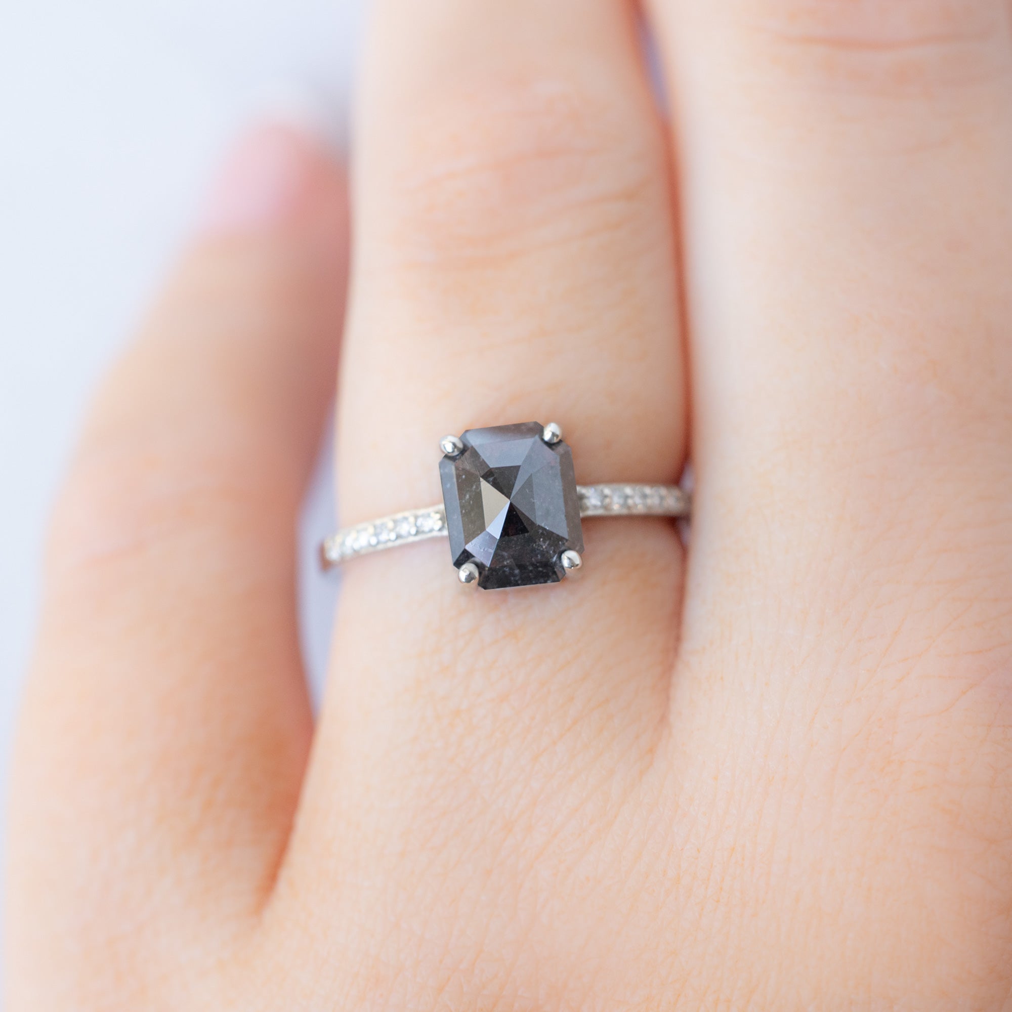 The Willow Ring with a 1.53ct Emerald Cut Black Diamond in 14K White Gold on Model