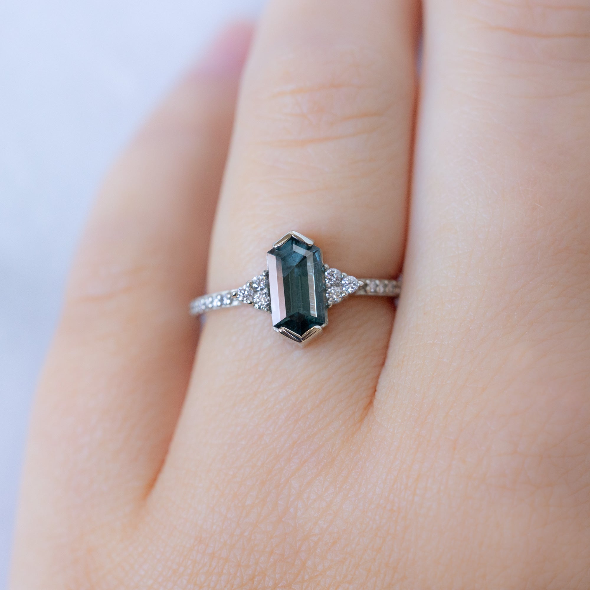 The Ivy Ring with a 1.22ct Hexagon Blue Spinel in 14K White Gold on Model