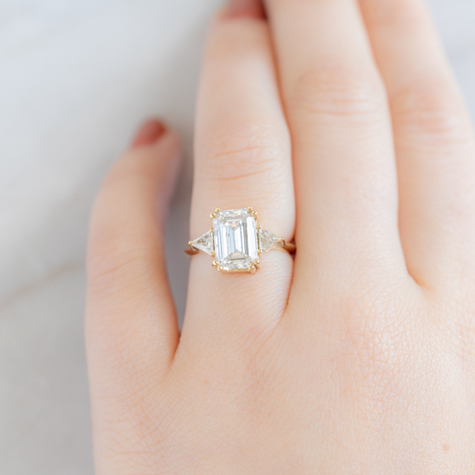 The Jade Luxe | 3.33ct Lab Grown Emerald Cut Diamond in 18K Yellow Gold on Model