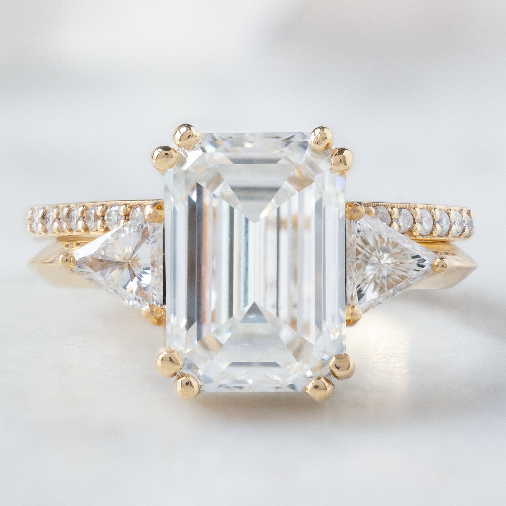 The Jade Luxe | 3.33ct Lab Grown Emerald Cut Diamond in 18K Yellow Gold with Open Cuff Pavé Diamond Stacking Band