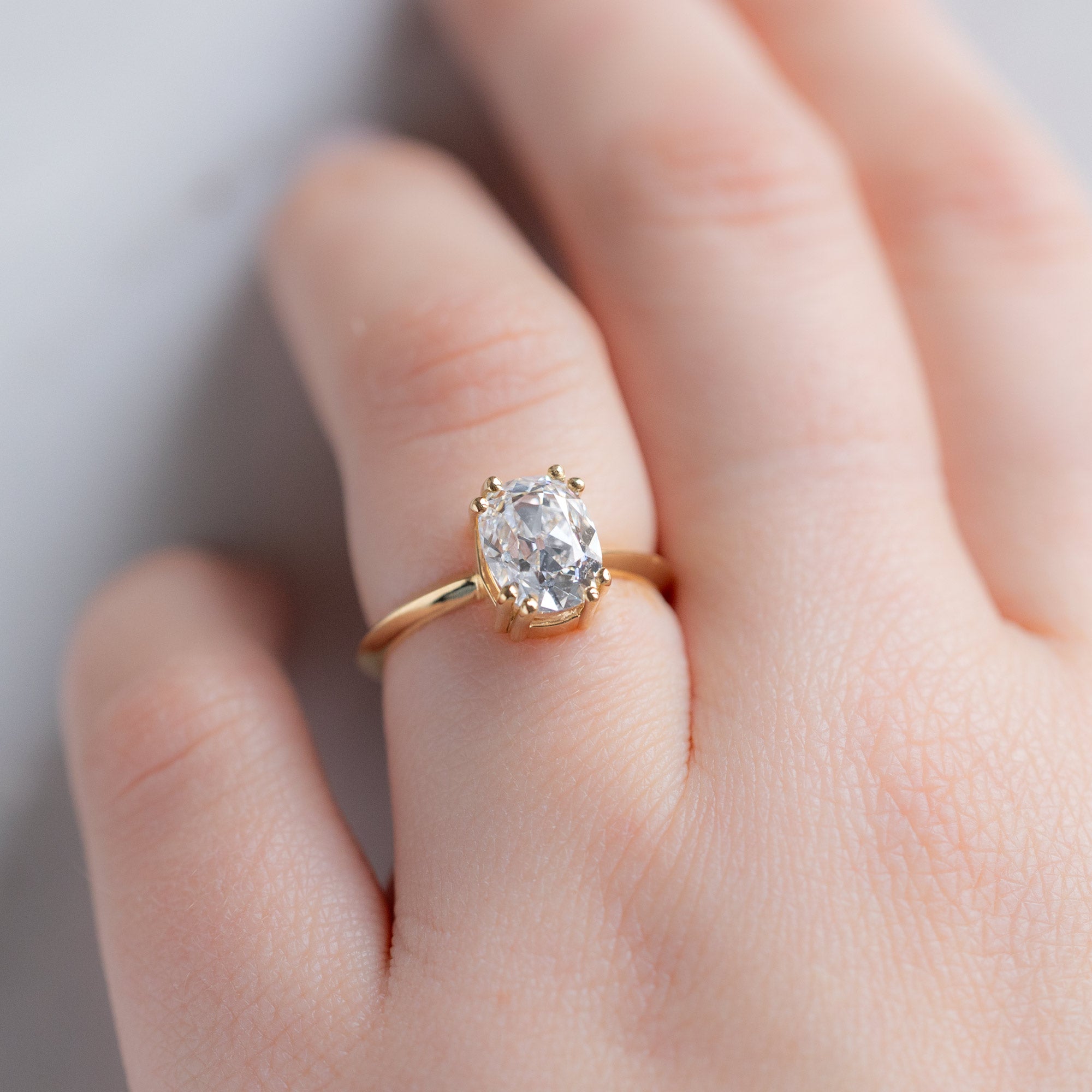 The Bryn Ring with a 2.05ct Old Mine Cut Lab Grown Diamond in 18K Yellow Gold on Model