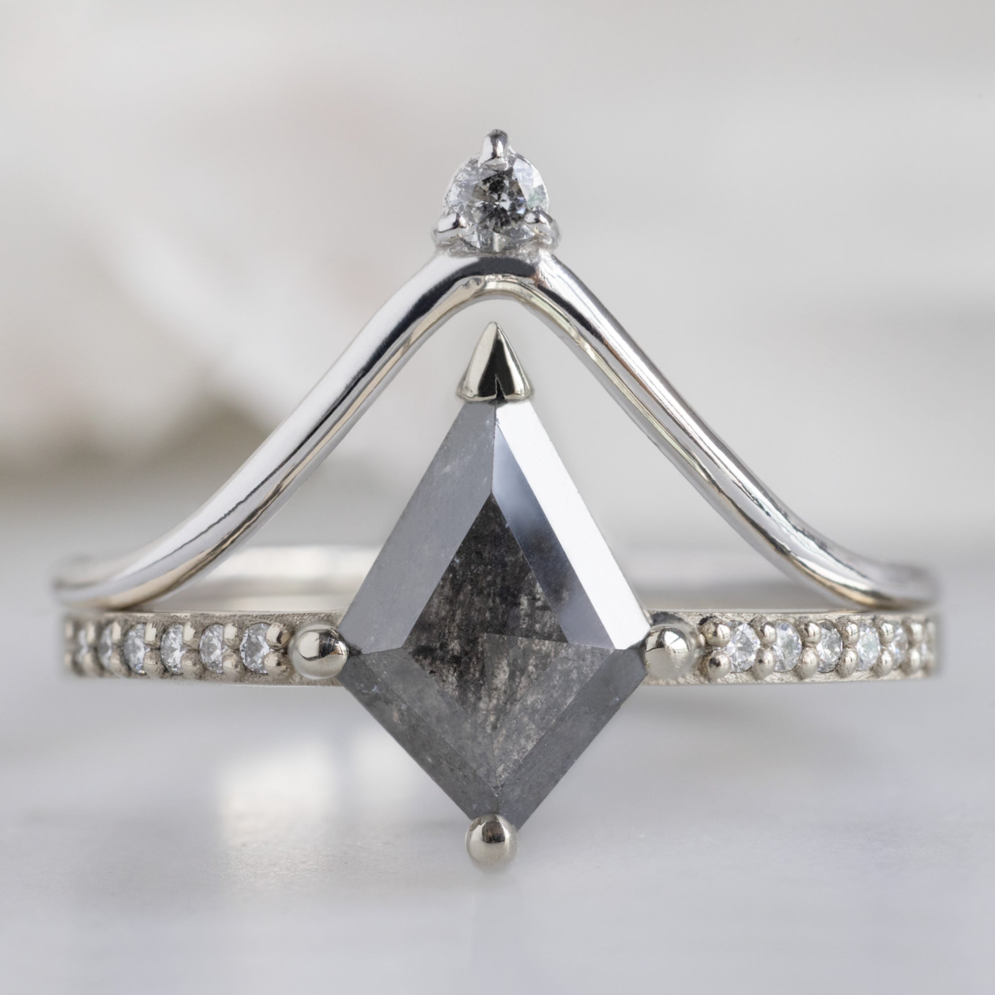 The Willow Ring with a 1.19ct Kite Salt and Pepper Diamond in 18K White Gold Stacked with the Diamond Crown Stacking Band