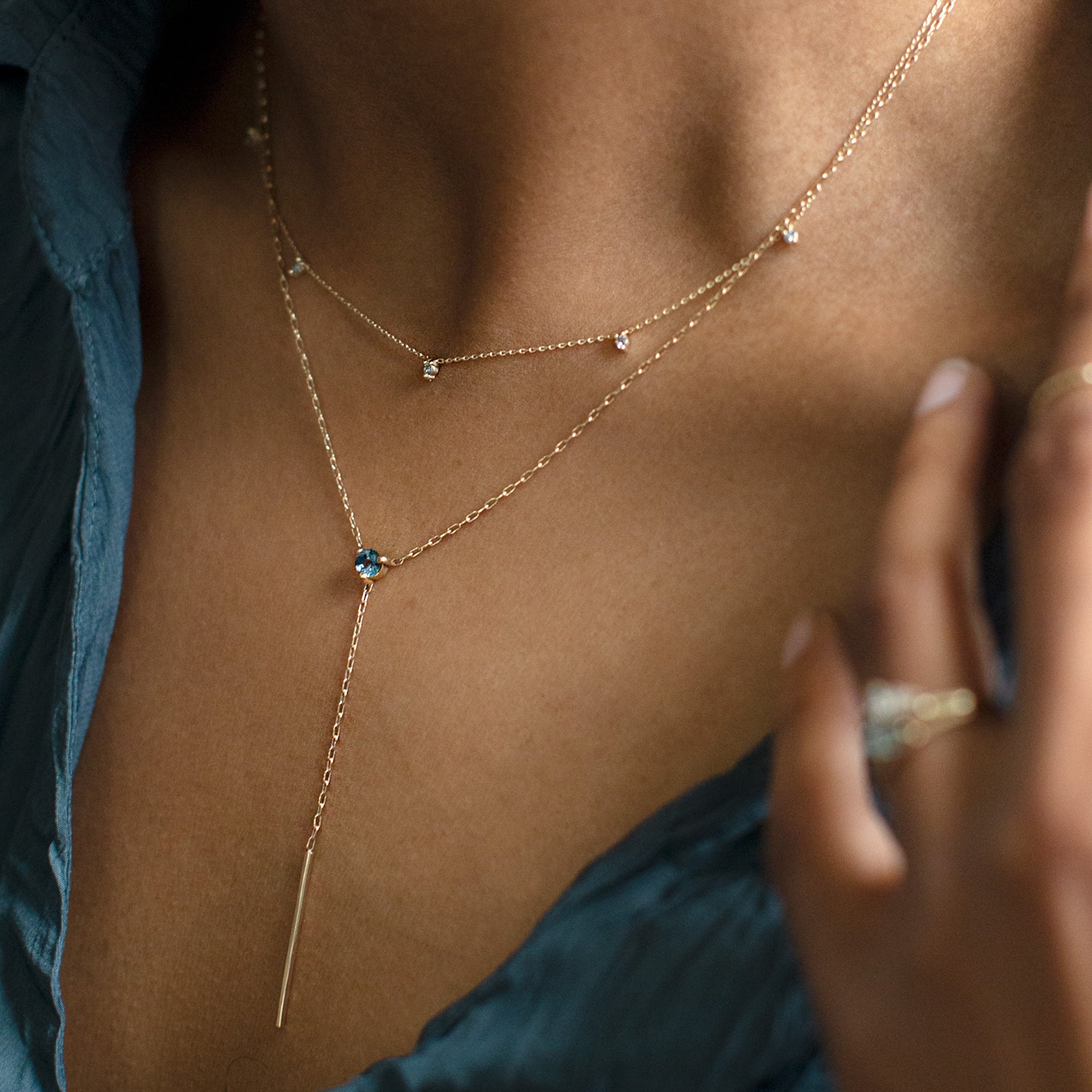 buy:the-diamond-sunburst-necklace-10k-yellow-gold,the-blue-montana-sapphire-gemstone-lariat-necklace-10k-yellow-gold