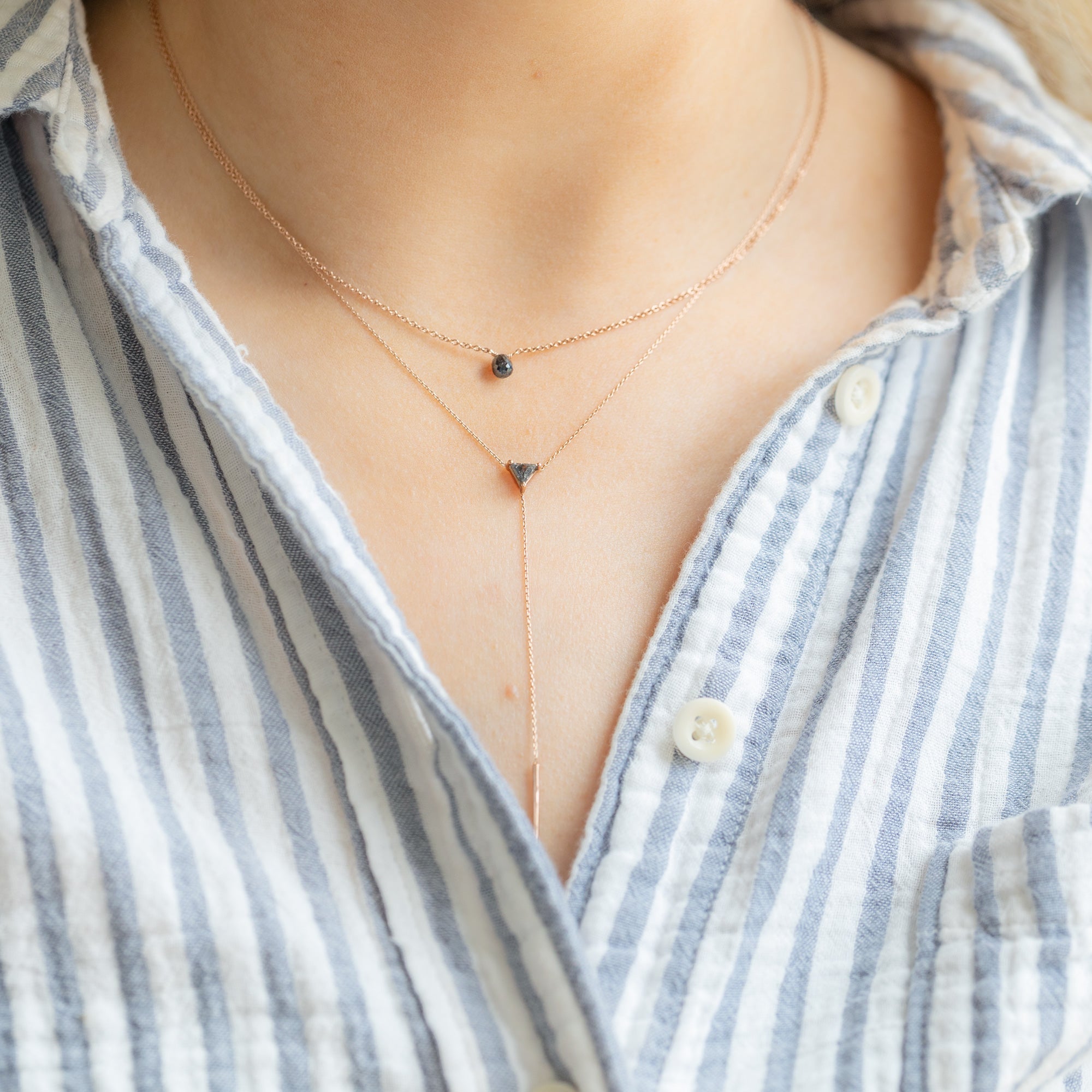 buy:the-trillion-black-diamond-lariat-necklace-14k-rose-gold,the-simple-black-diamond-briolette-necklace-rose-gold-filled