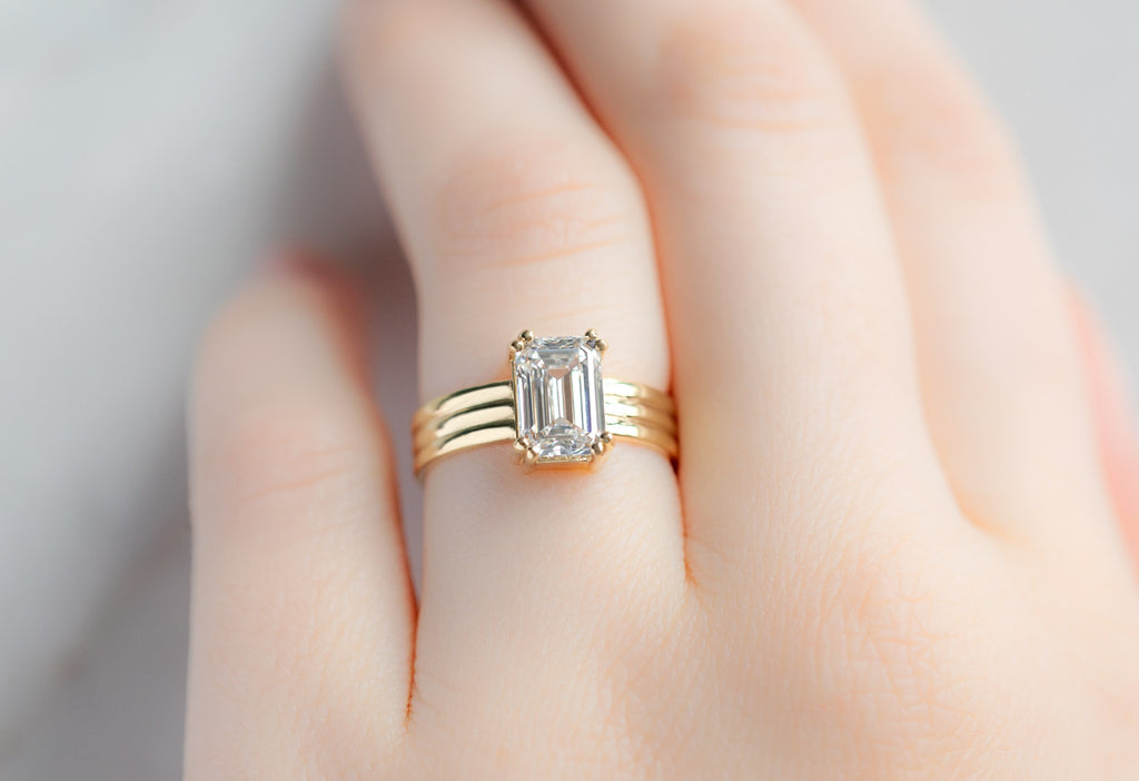The Bryn Ring with an Emerald-Cut Lab Grown Diamond on Model