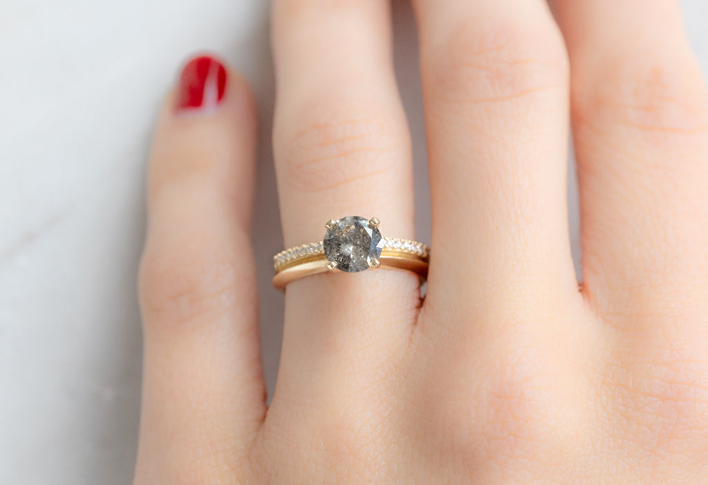 The Duo Pavé Band Ring with a Round Salt and Pepper Diamond on Model