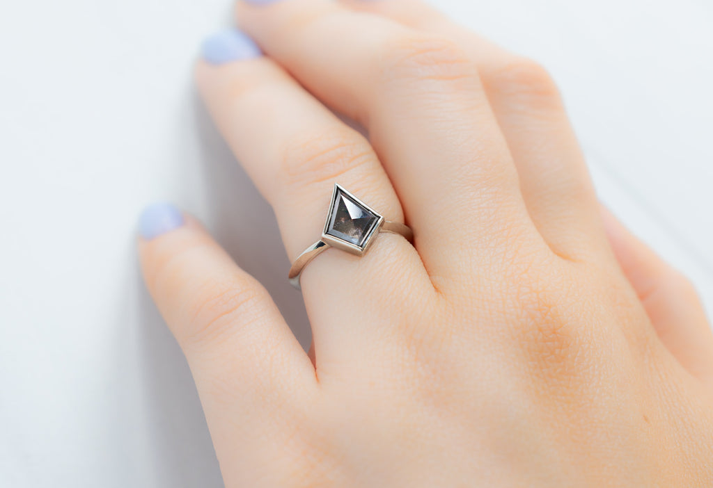 The Hazel Ring with a Black Kite-Shaped Diamond on Model