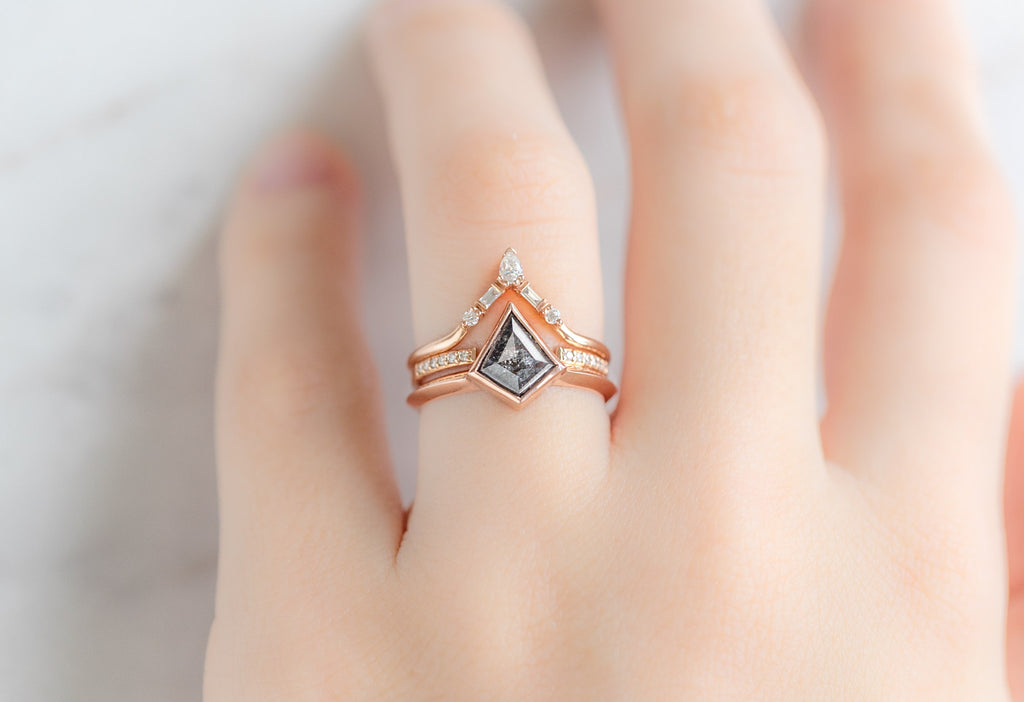 The Hazel Ring with Kite-Shaped Black Diamond with White Diamond Stacking Bands on Model