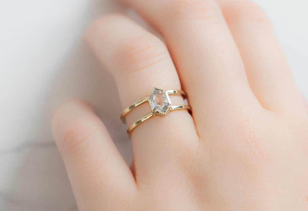 The Poppy Ring with a White Hexagon Diamond on Model