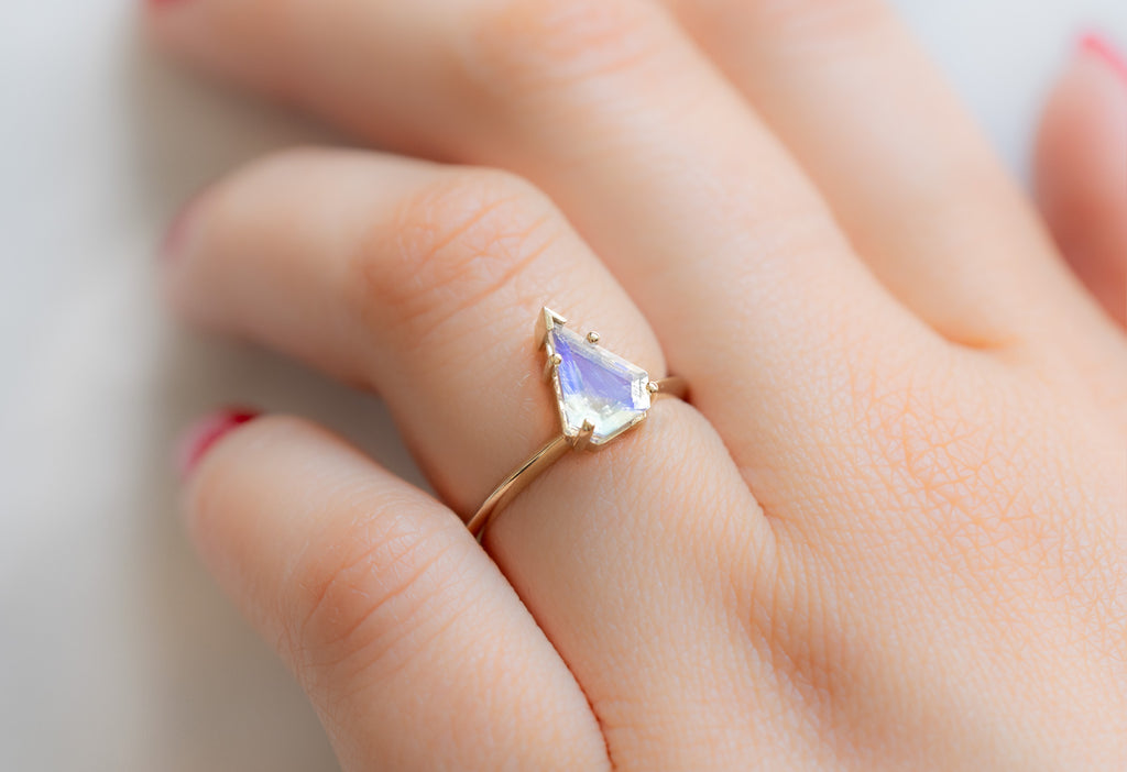 The Sage Ring with a Shield-Cut Moonstone on Model