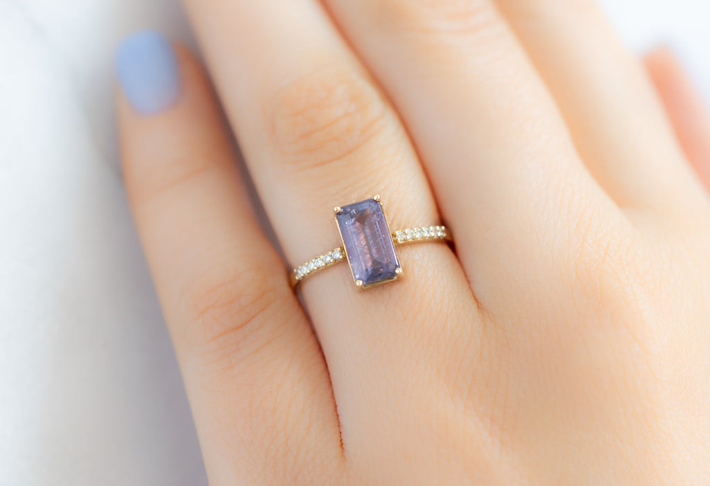 The Willow Ring with an Emerald-Cut Violet Sapphire on Model