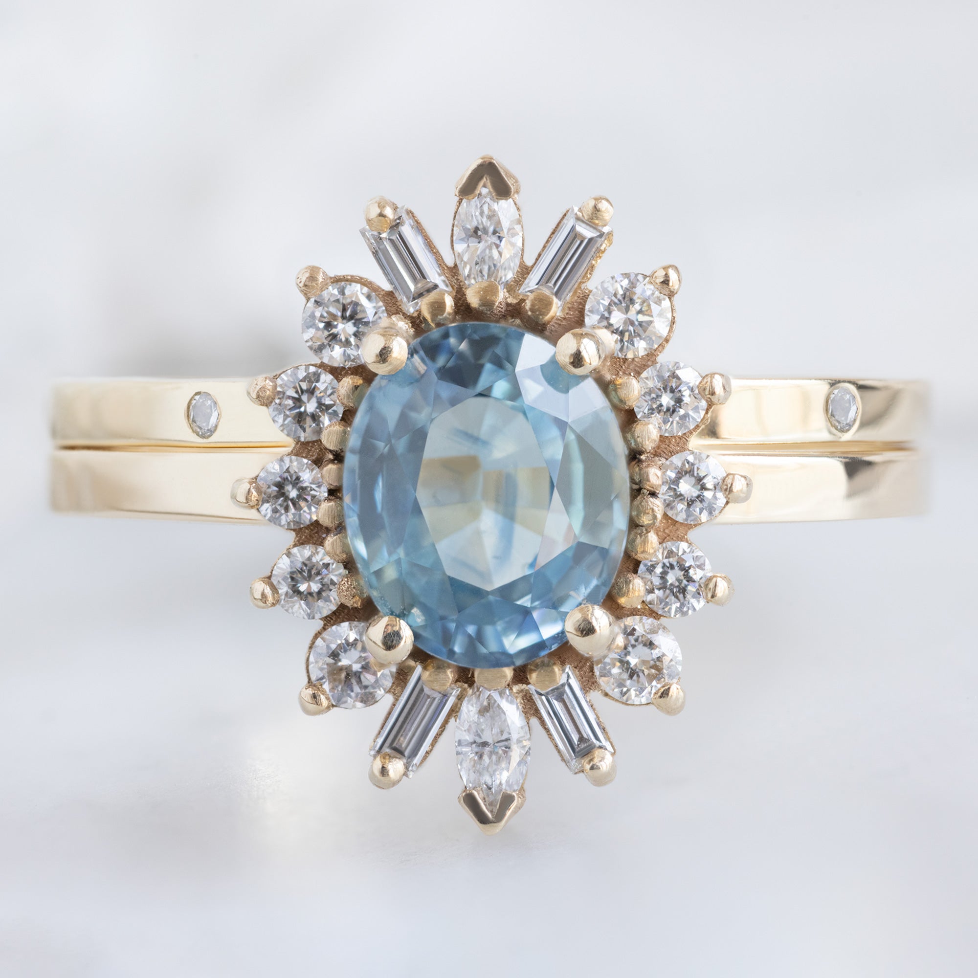 White Diamond Eternity Band in 14K Yellow Gold Stacked with Oval Sapphire Gemstone Engagement Ring