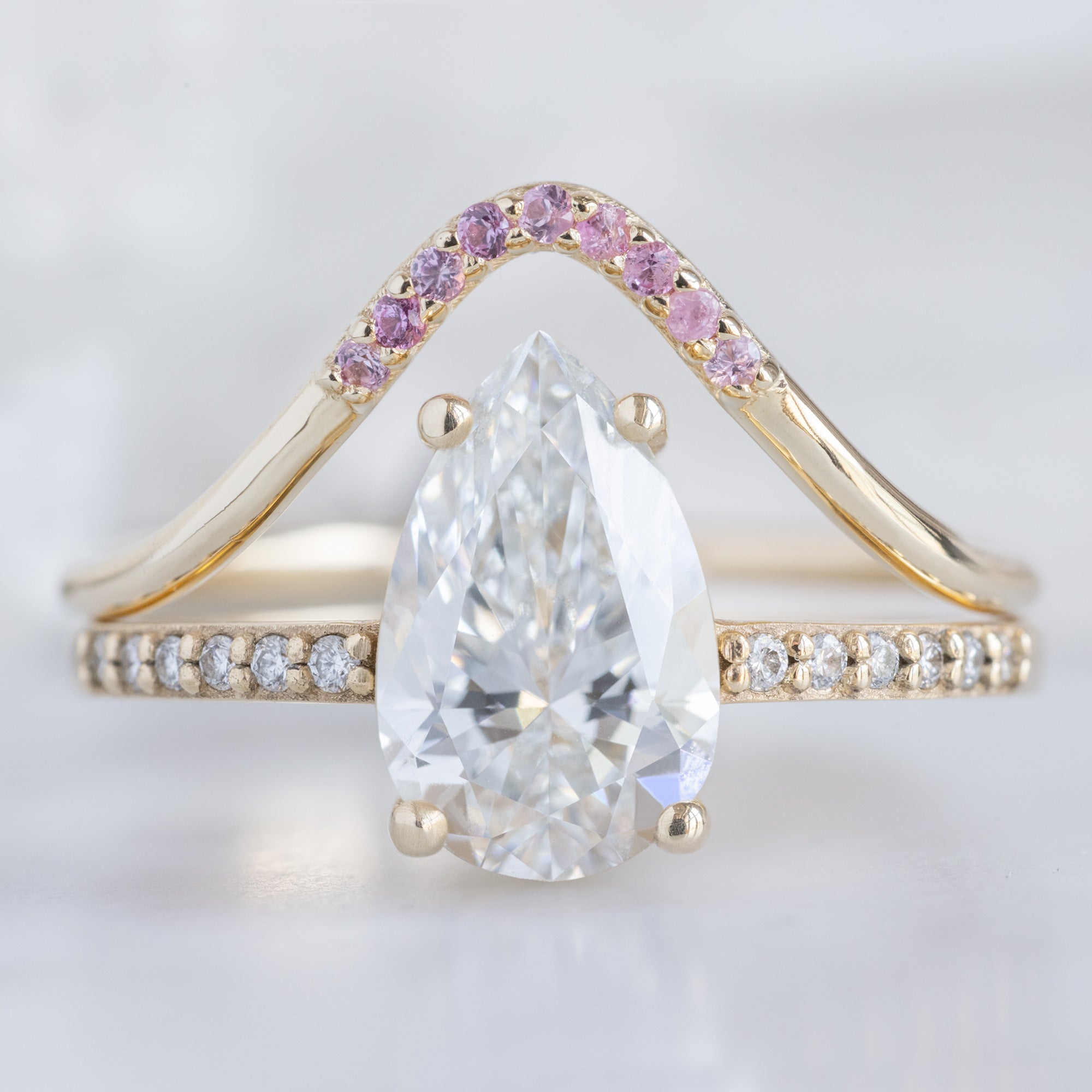 One of a Kind Ruby Pavé Peak Stacking Band in Yellow Gold Stacked with White Diamond Pear Engagement Ring