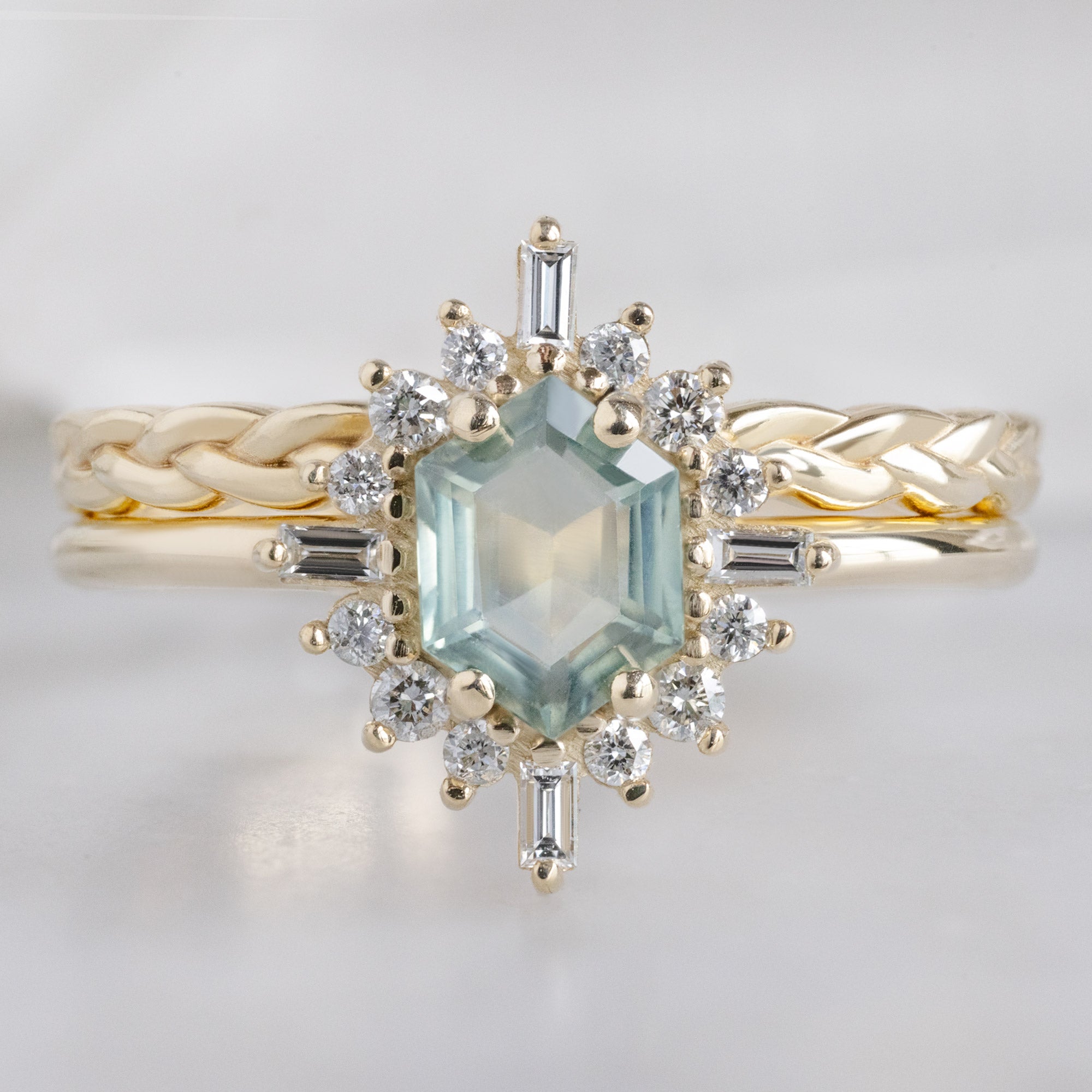The Gold Braided Stacking Ring in 14K Yellow Gold Stacked with Sapphire Hexagon Engagement Ring