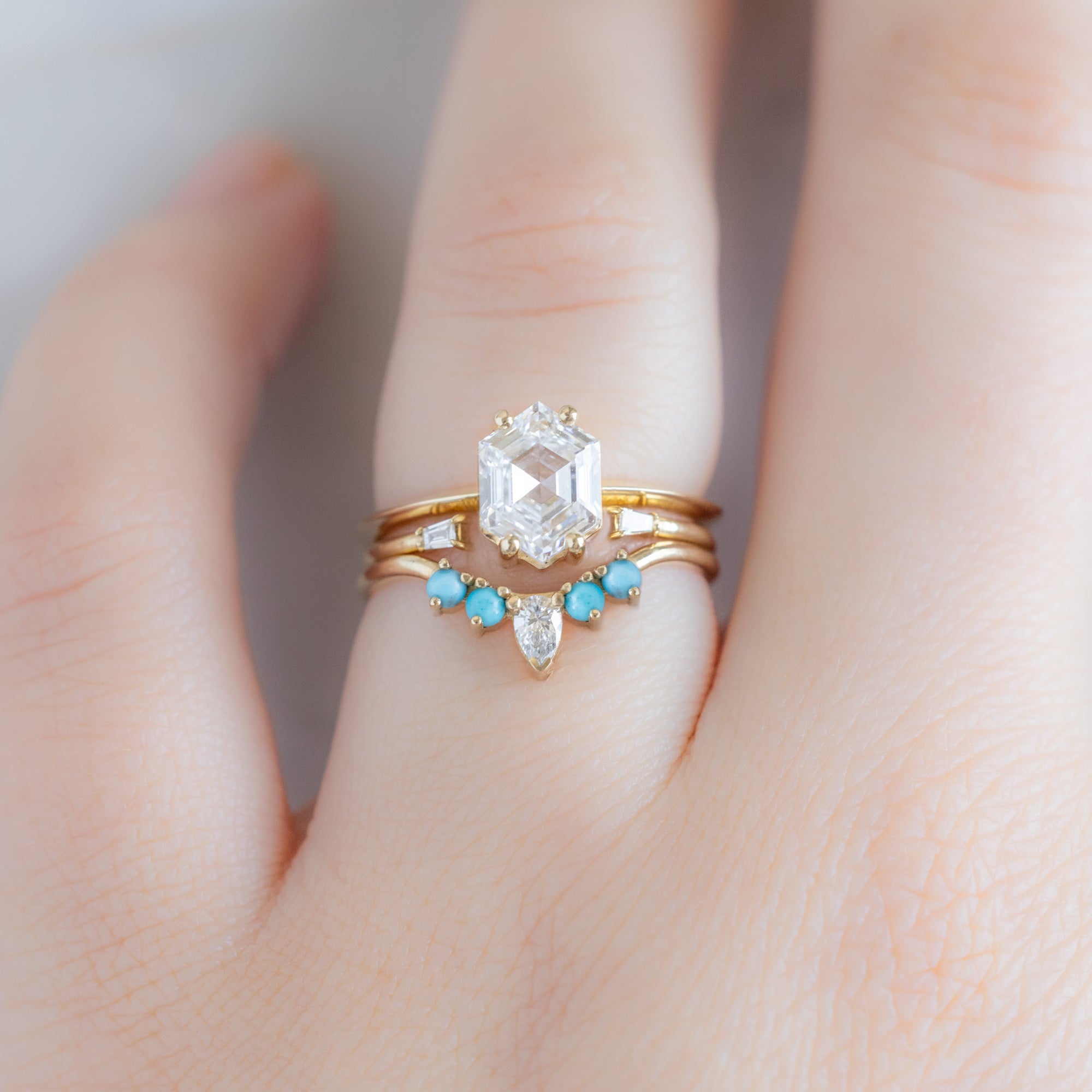 White Diamond and Turquoise 4-Stone Sunburst Stacking Band in 14K Yellow Gold Stacked with White Diamond Hexagon Engagement Ring on Model
