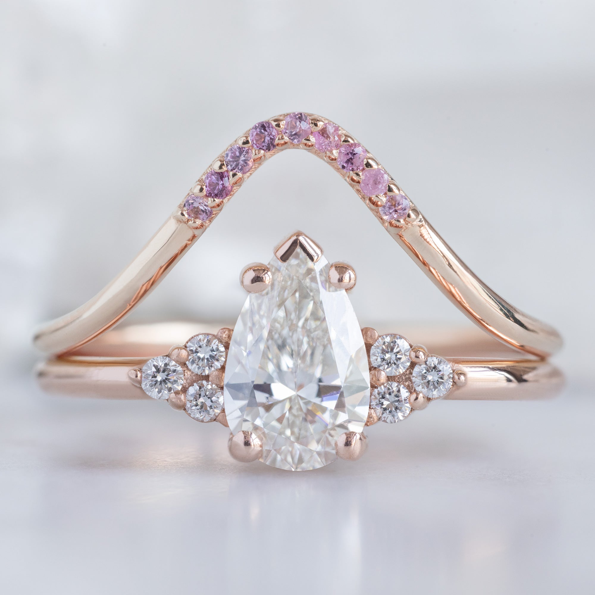 One of a Kind Ruby Pavé Peak Stacking Band in Rose Gold Stacked with White Diamond Pear Engagement Ring