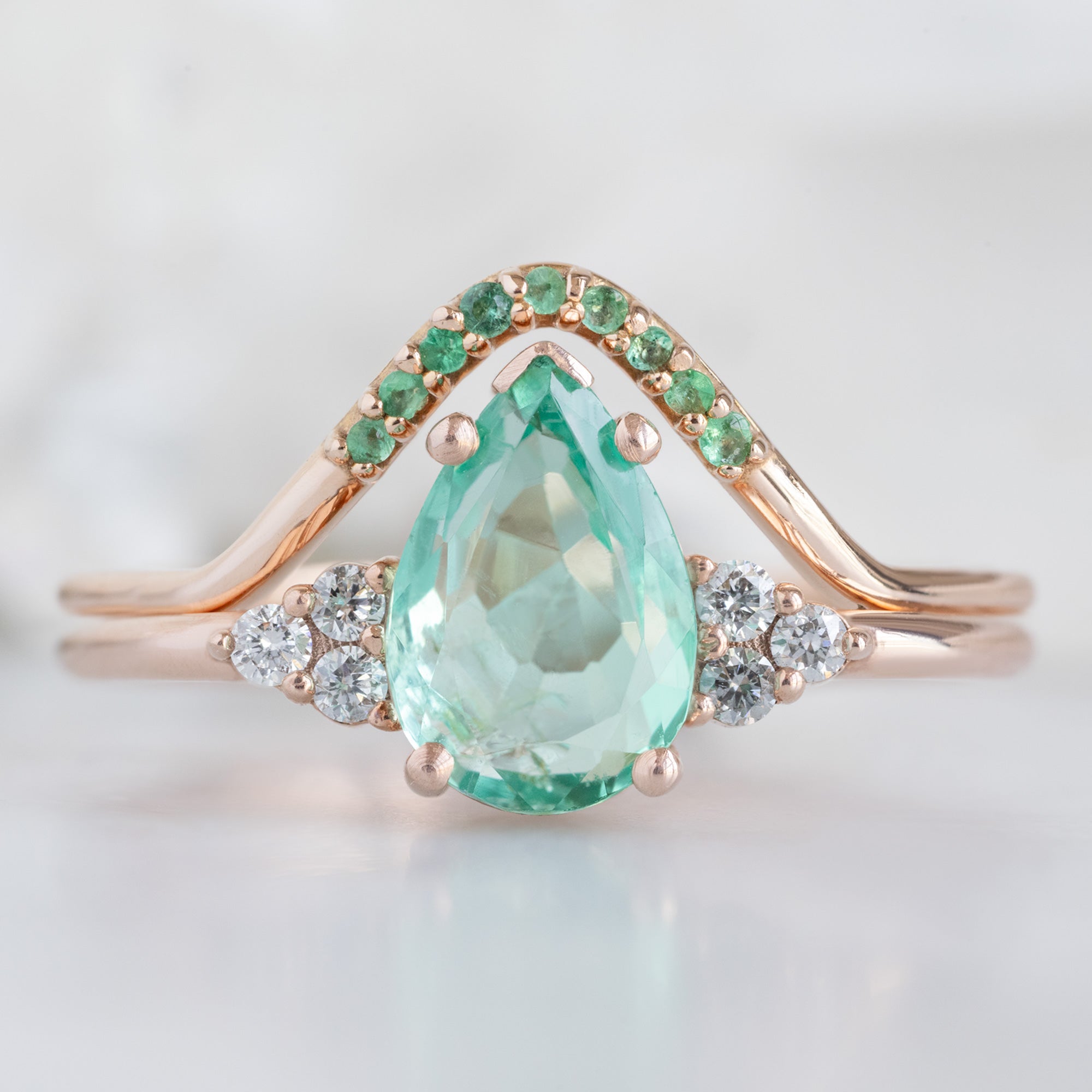 One of a Kind Emerald Pavé Peak Stacking Band in Rose Gold stacked with Pear Shaped Emerald Gemstone Engagement Ring
