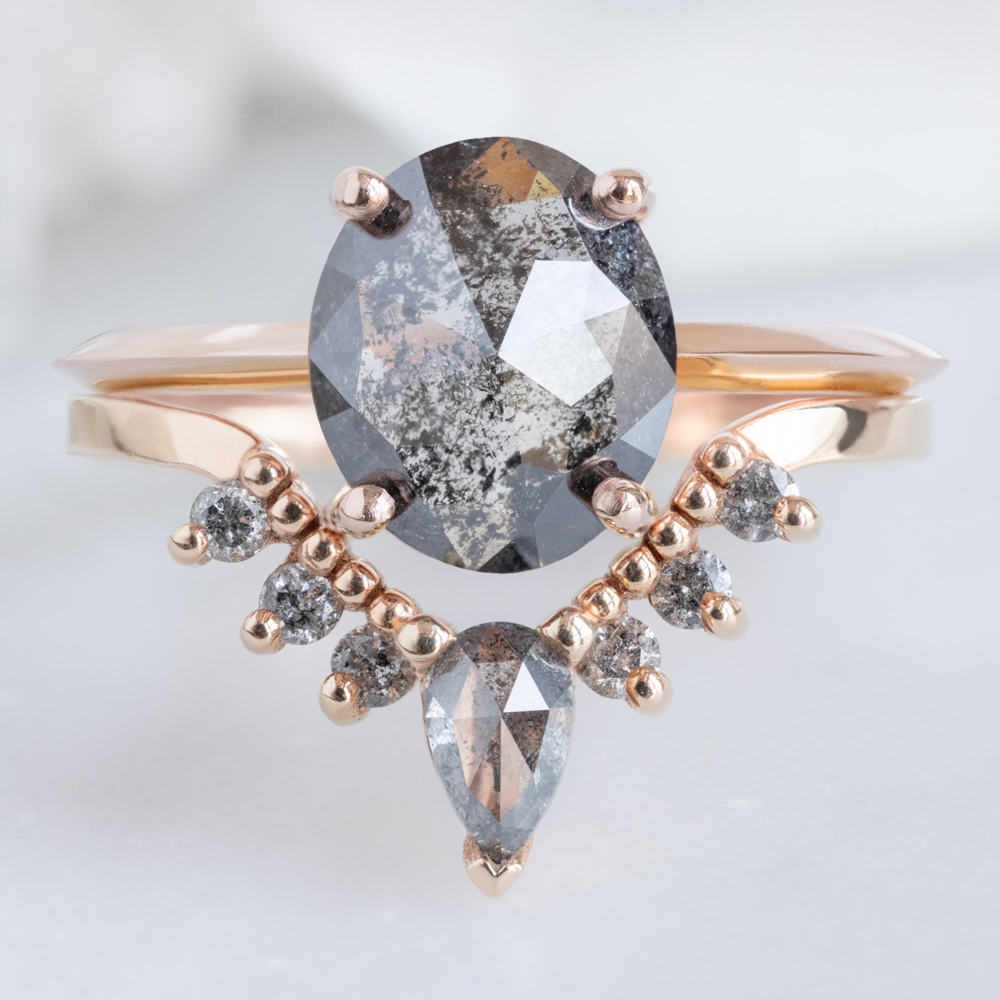 Salt and Pepper Diamond Sunburst Stacking Band in 14K Rose Gold Stacked with Oval Salt and Pepper Diamond Engagement Ring