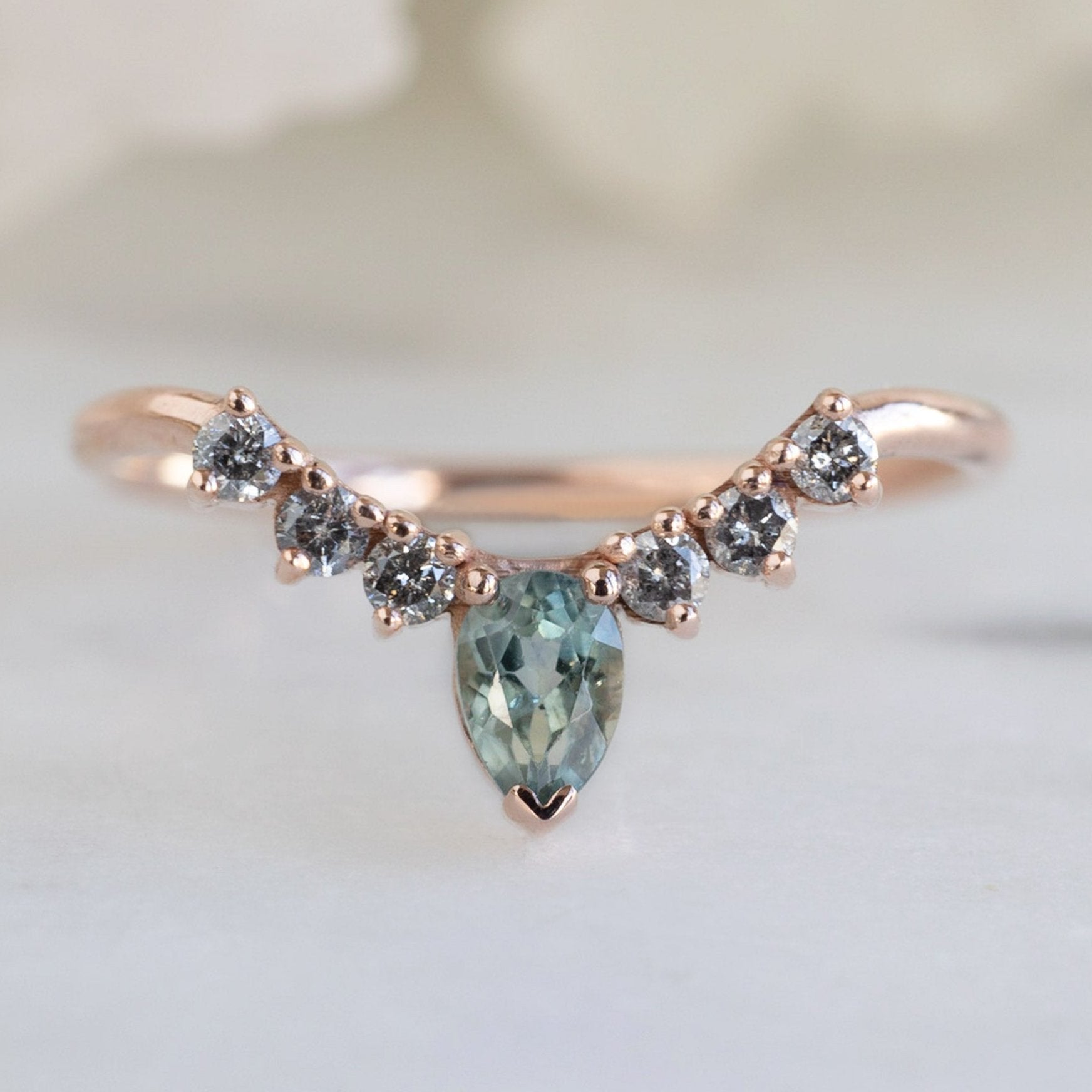 One of a Kind Montana Sapphire and Salt and Pepper Diamond Sunburst Stacking Band in Rose Gold on White Marble
