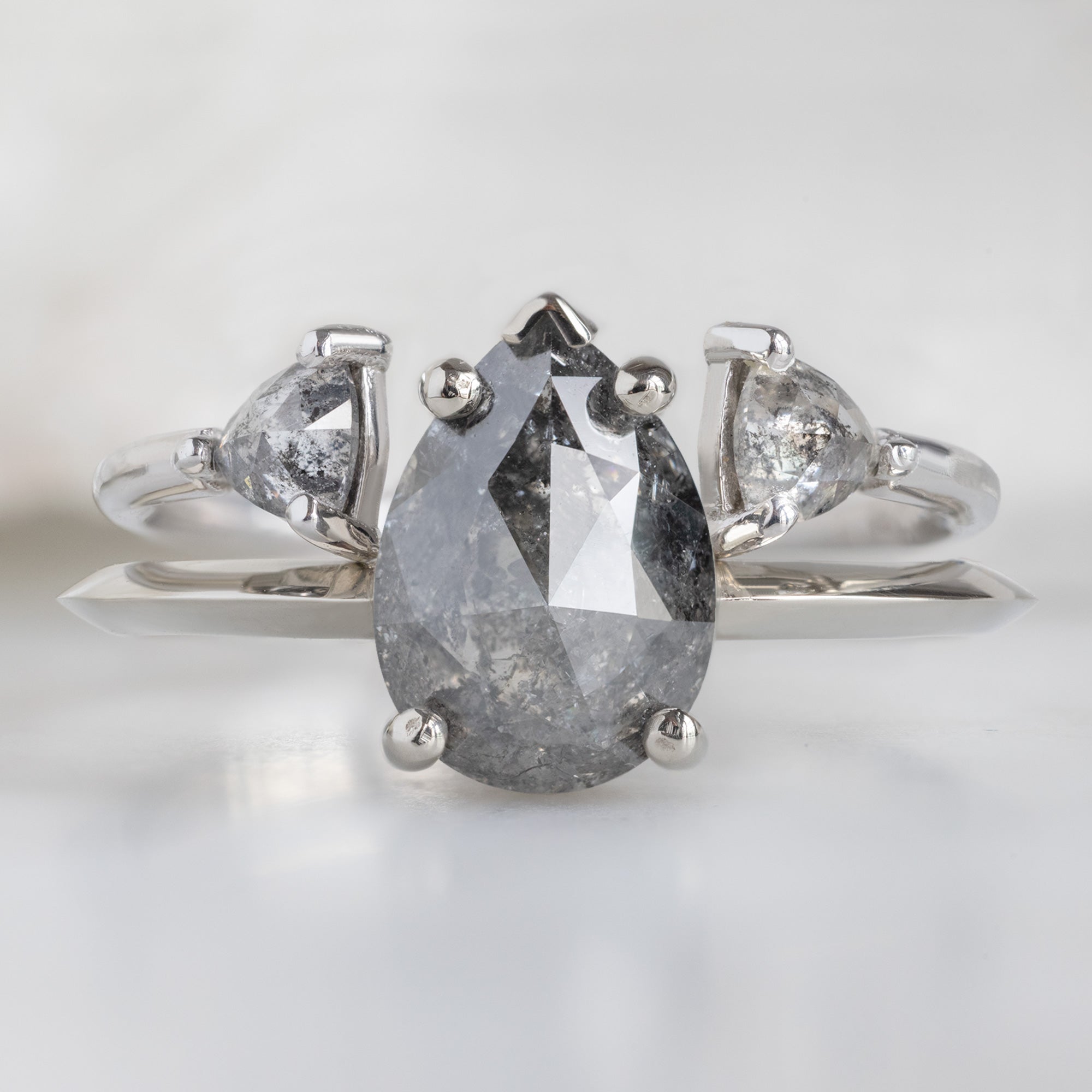 Open Cuff Salt and Pepper Diamond Trillion Stacking Band in White Gold Stacked with Black Pear Diamond Engagement Ring