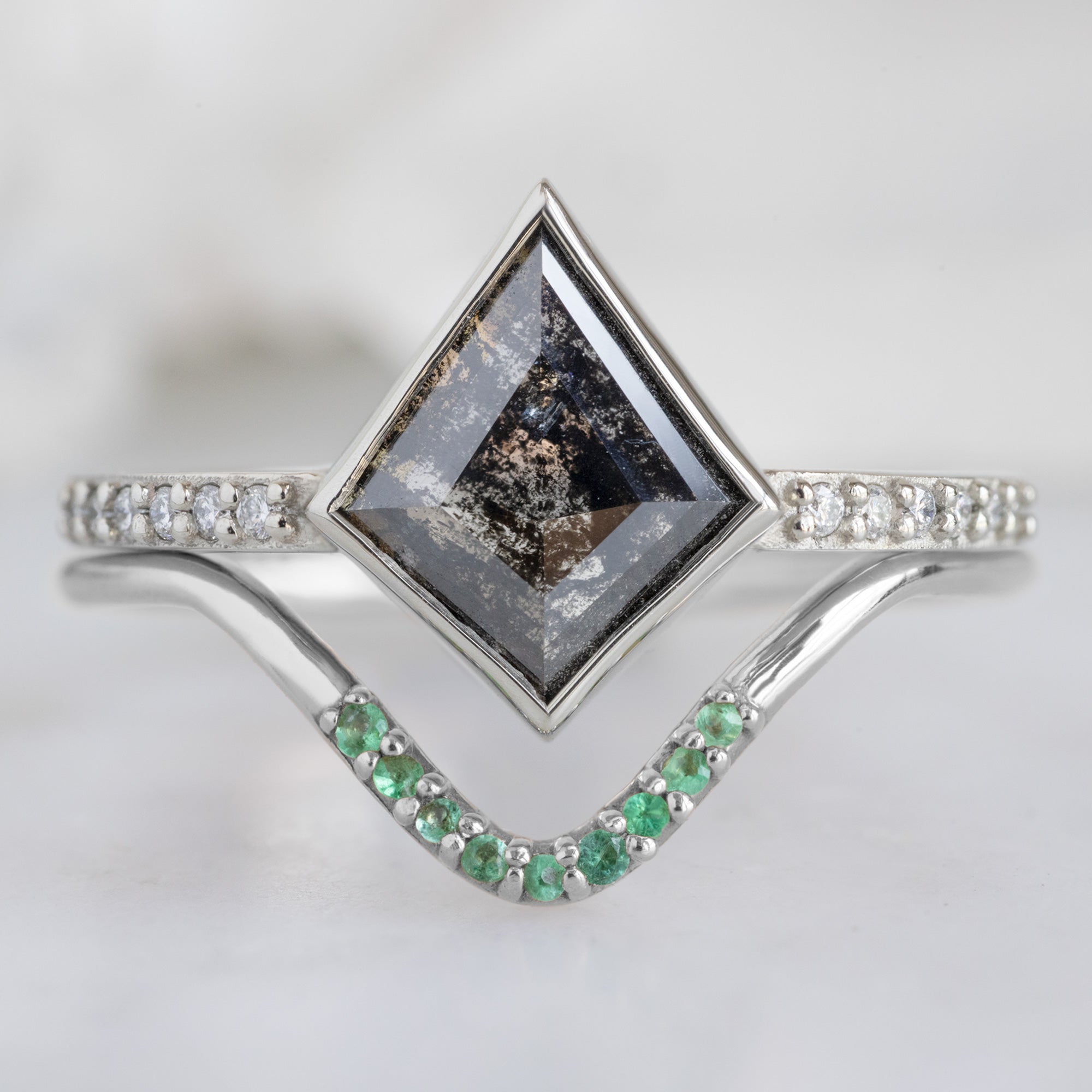 One of a Kind Emerald Pavé Peak Stacking Band in White Gold Stacked with a Black Kite Diamond Engagement Ring