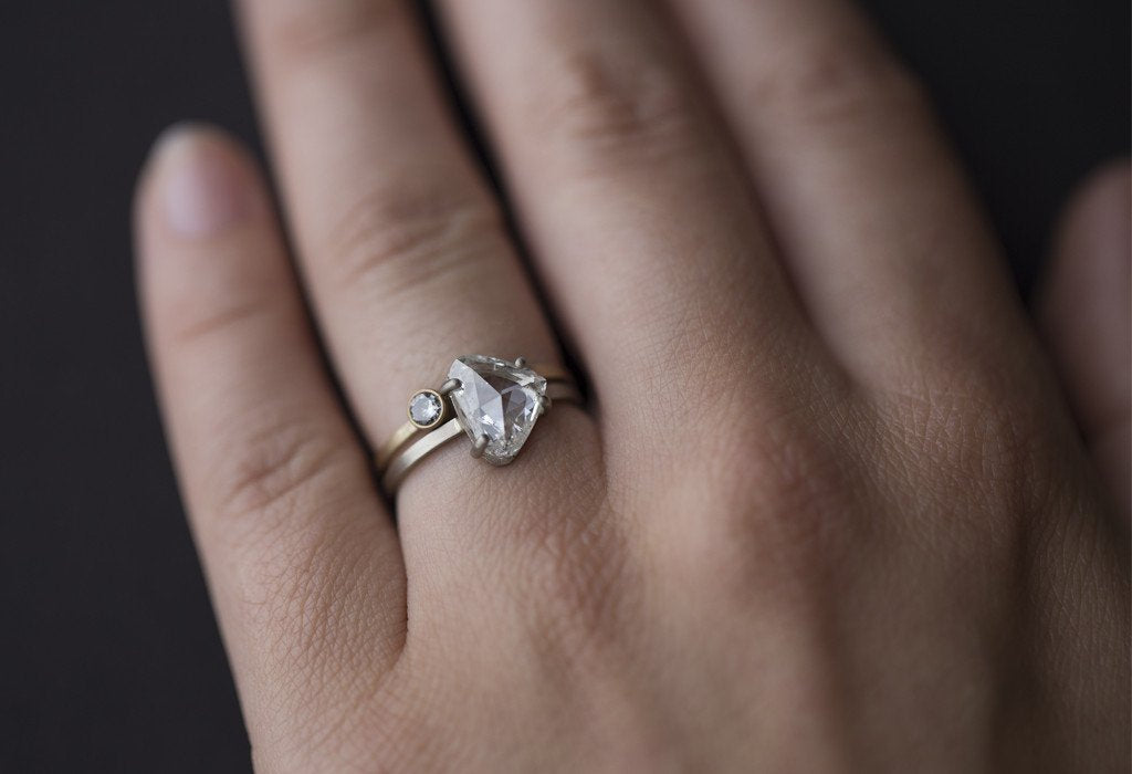 Geometric Diamond Engagement Ring on Model with Stacking Band