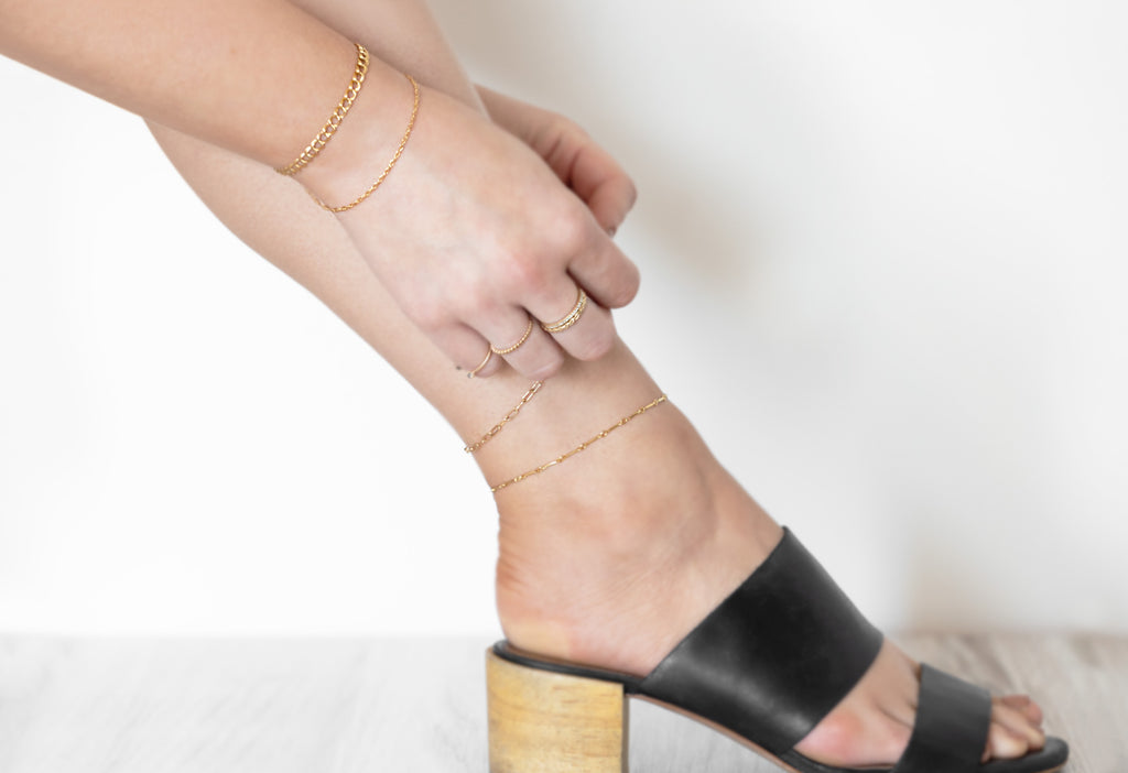 Bar Chain Anklet + Bracelets on Model in Black Mule Sandals