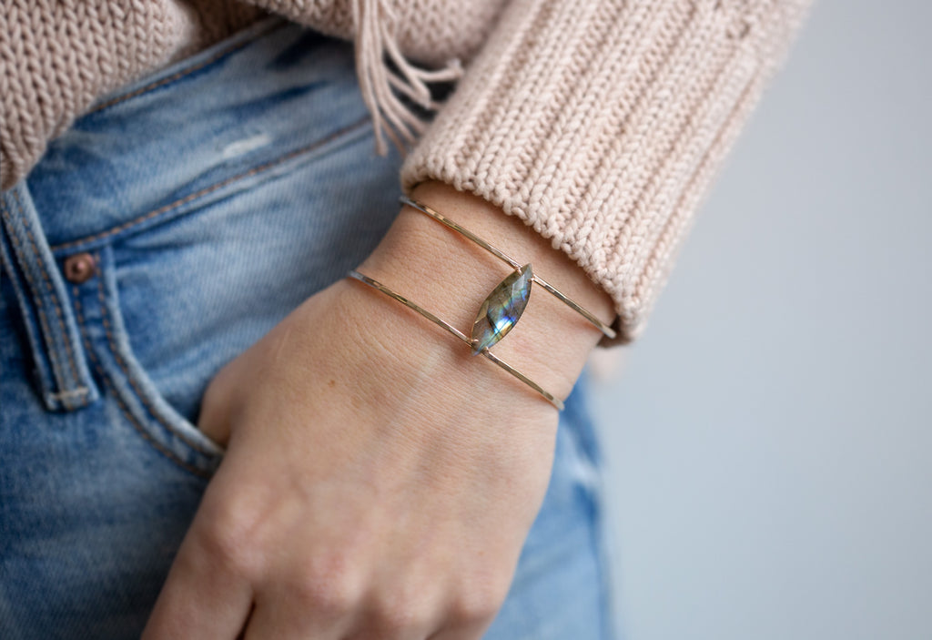 Model With Hand in Pocket Wearing Labradorite Cage Cuff