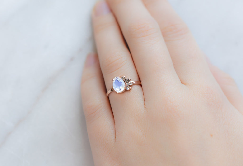 One of a Kind Pear-Cut Moonstone + Diamond Cluster Ring on Model