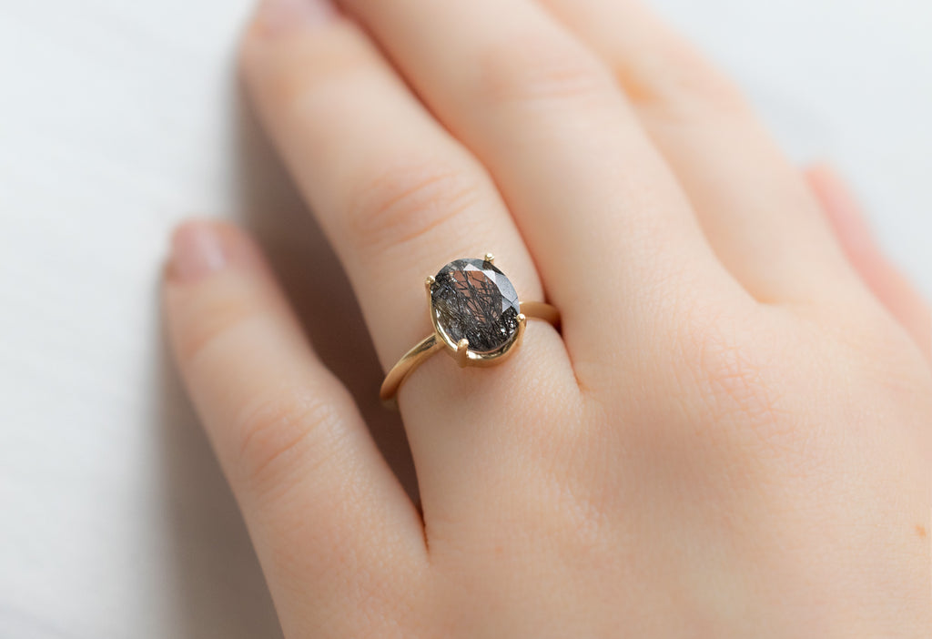The Bryn Ring with an Oval-Cut Tourmaline In Quartz on Model