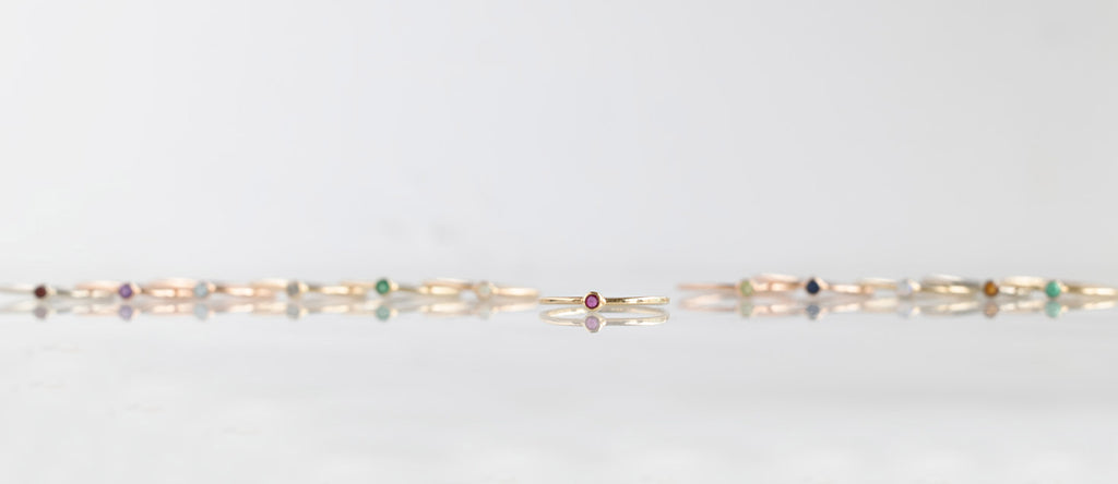 Alexis Russell Birthstone Stackers in a line