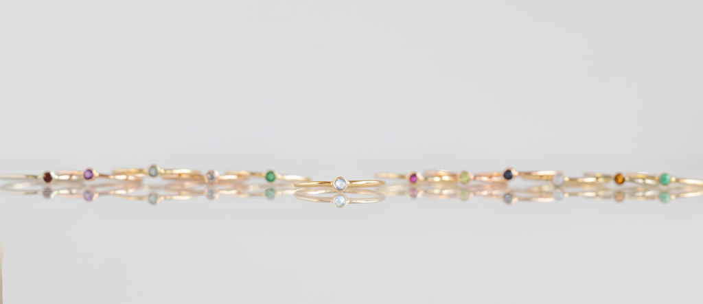 yellow gold emerald birthstone stacking ring