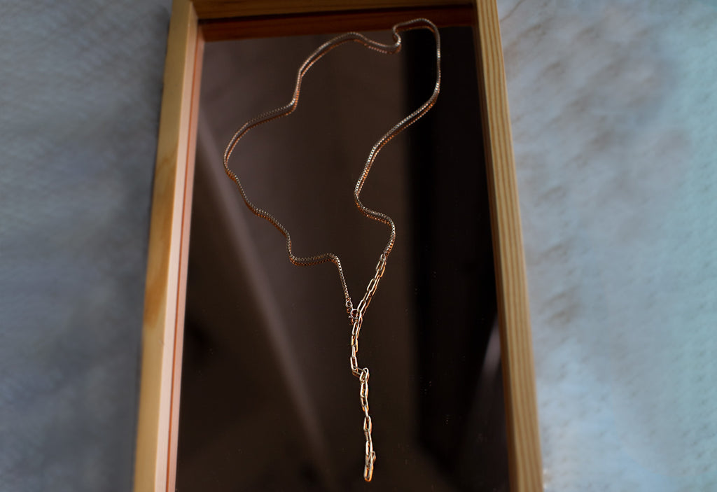 4-in-1 Cable Chain Necklace/Bracelet on mirror