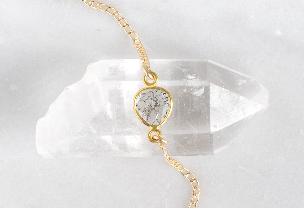 Yellow Gold Asymmetrical Diamond Slice Necklace Close Up on Crystal