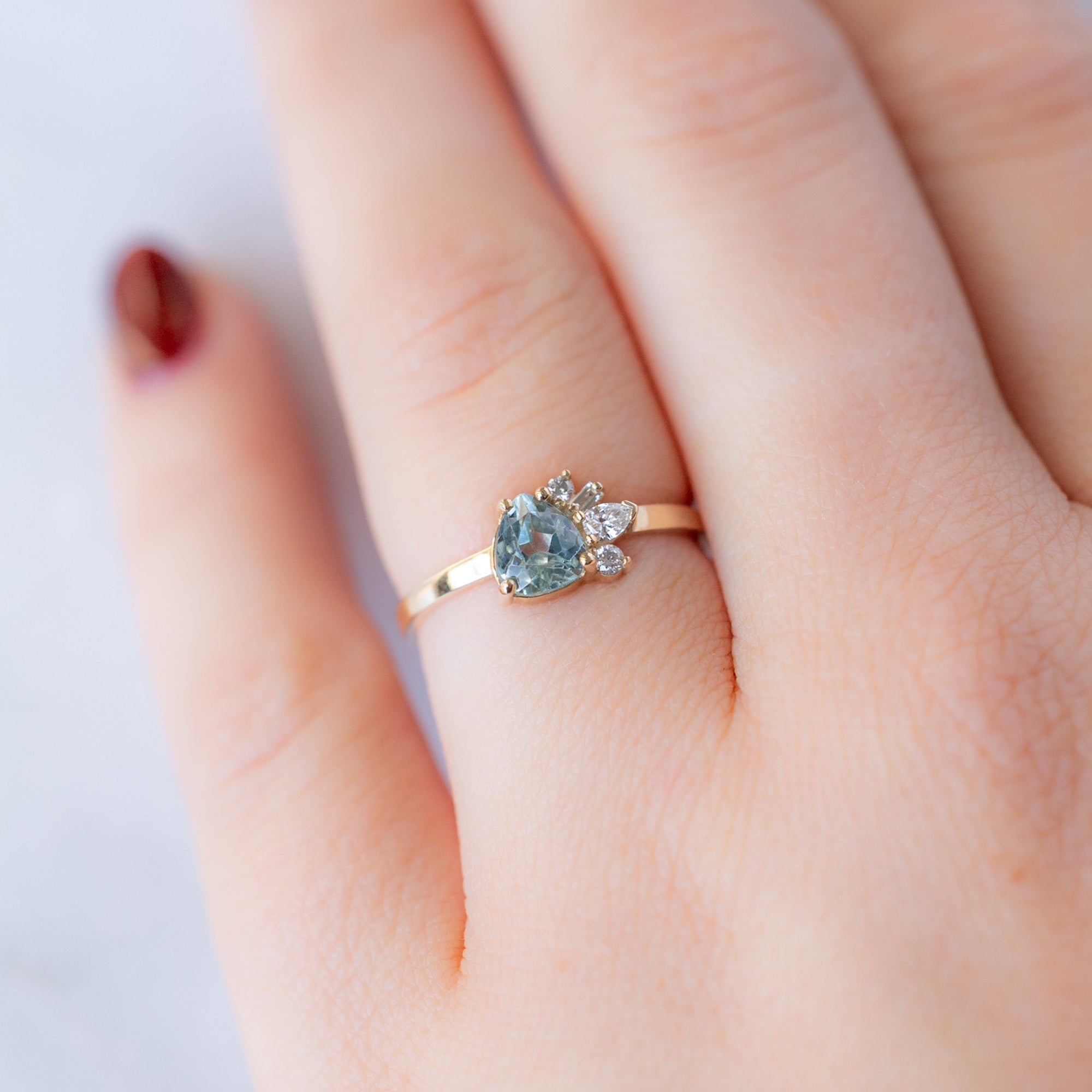 The Cluster Ring | 0.84ct Pear Cut Montana Sapphire in 14K Yellow Gold