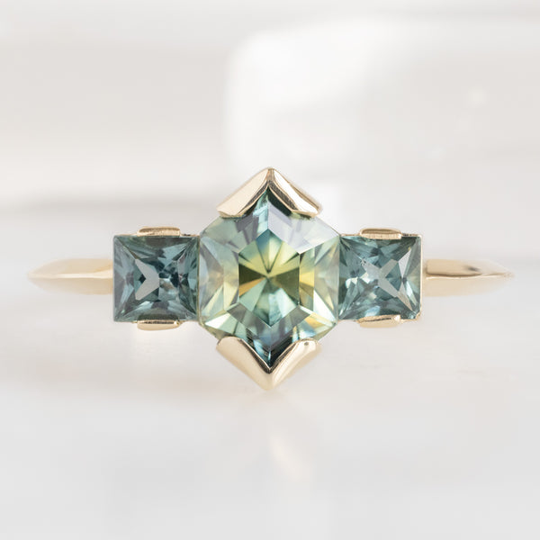The Watercolor Ring with a 1.2ct Hexagonal Parti Sapphire in 14K Yellow Gold on white background