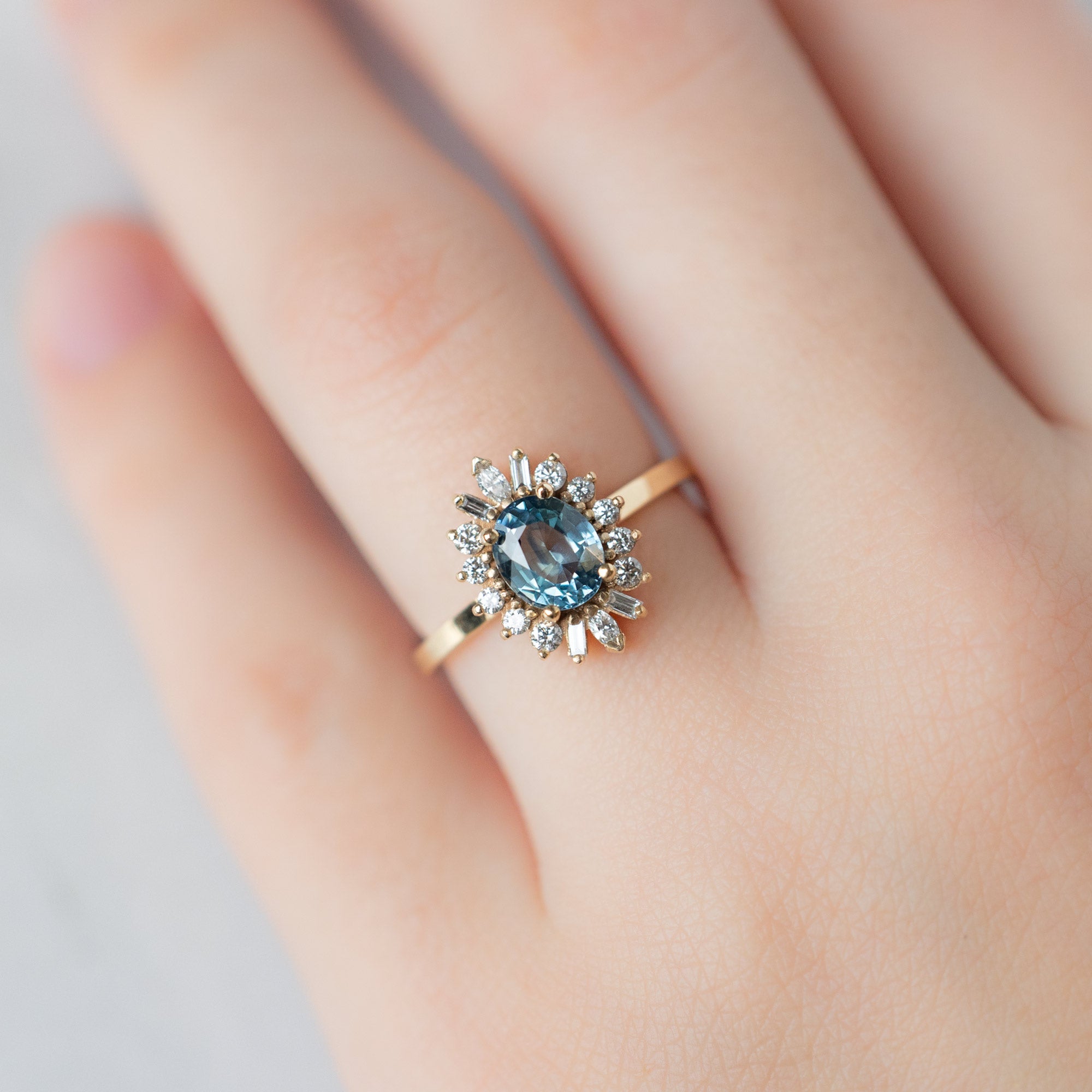 The Camellia Ring | 1.32ct Oval Blue Montana Sapphire in 14K Yellow Gold
