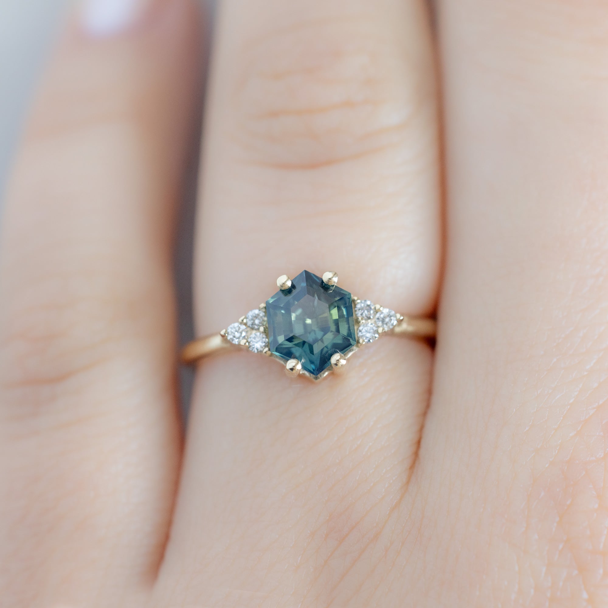 The Ivy Ring with a 1.37ct Hexagon Parti Sapphire in 14K Yellow Gold on Model