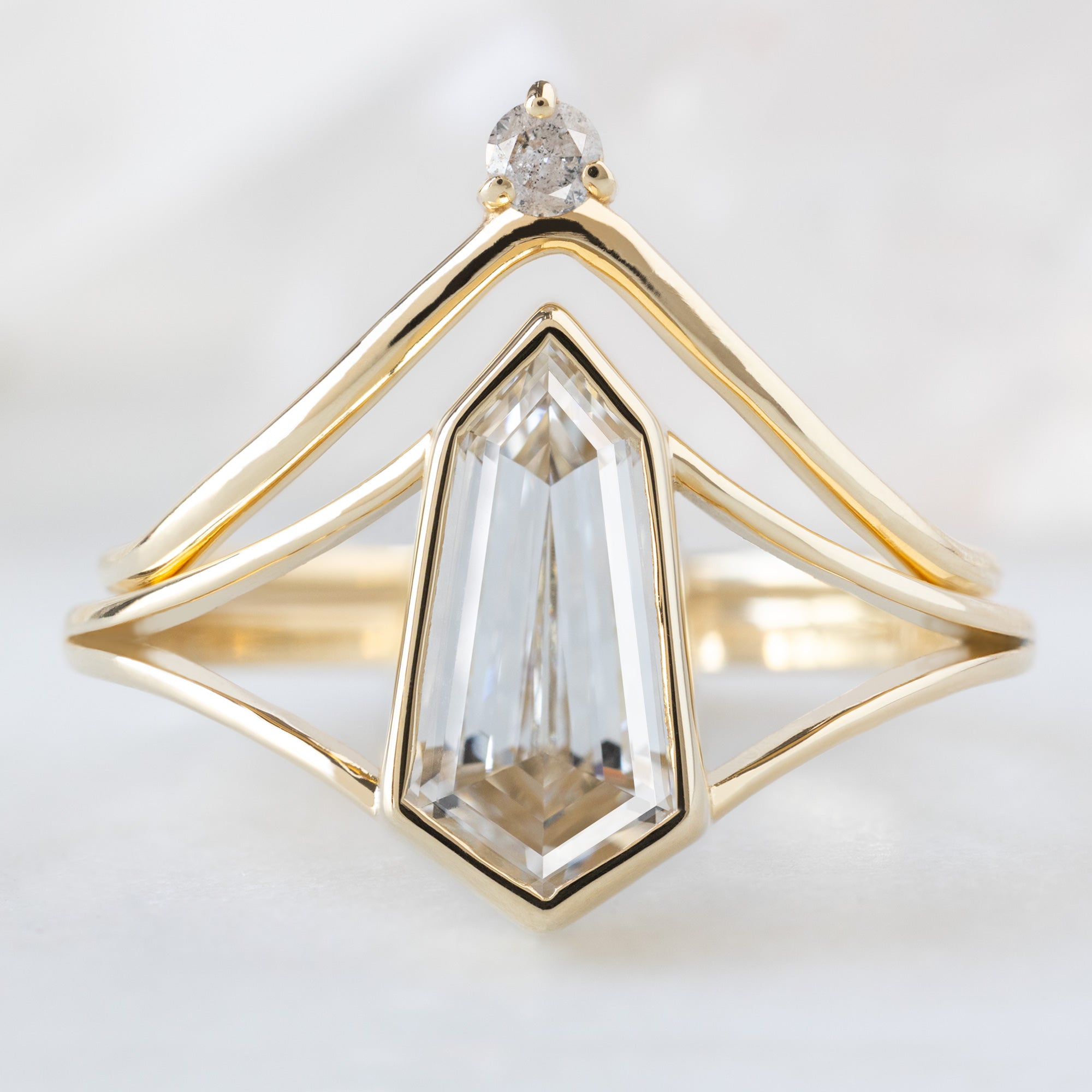 The Magnolia Ring with a 1.50ct Lab Grown Geometric White Diamond in 14K Yellow Gold Stacked with the White Diamond Crown Stacking Band