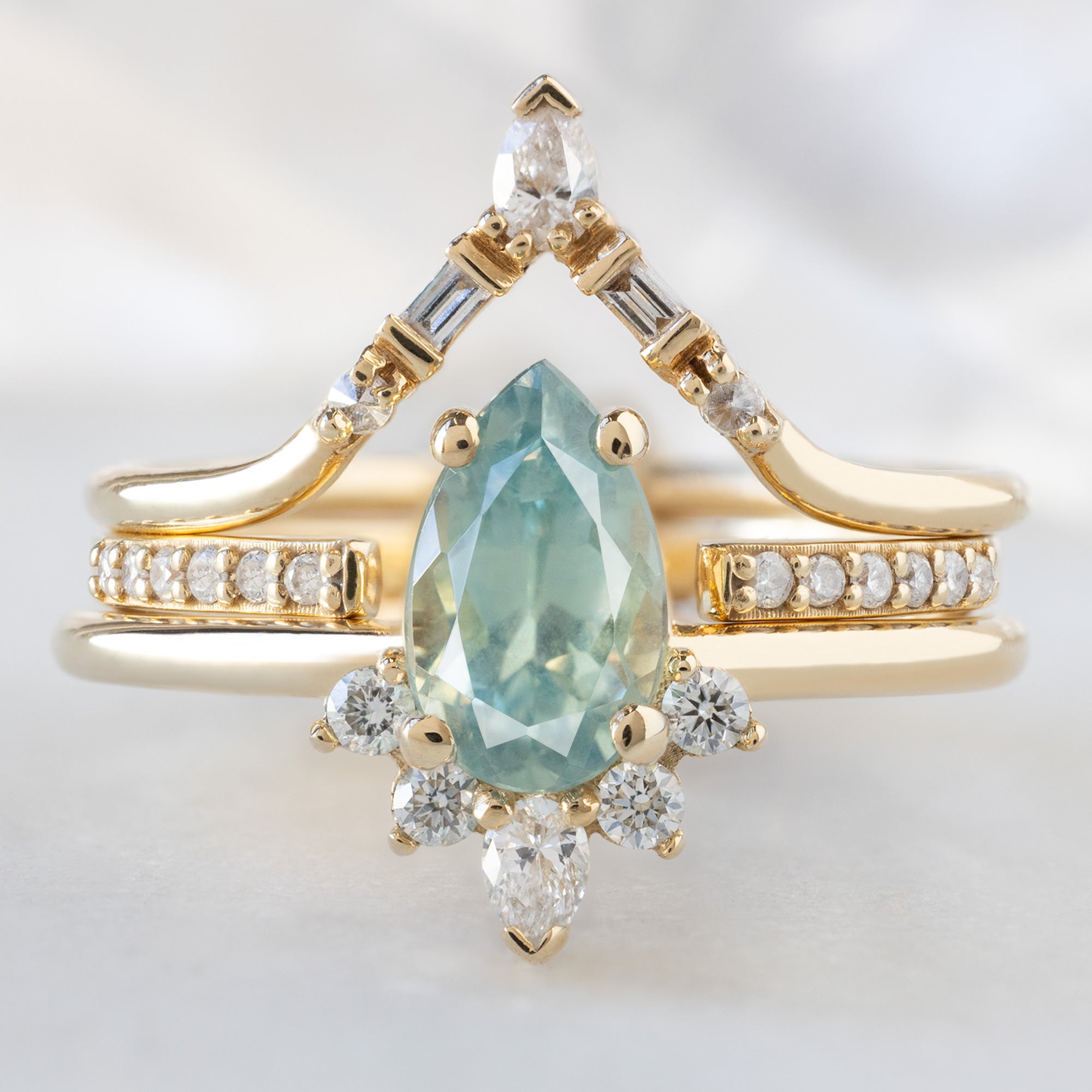 buy:white-diamond-tiara-stacking-band-14k-or-18k-yellow-gold,open-cuff-white-diamond-pave-stacking-band-14k-or-18k-yellow-gold,the-aster-ring-1-18ct-pear-blue-sapphire-in-14k-yellow-gold