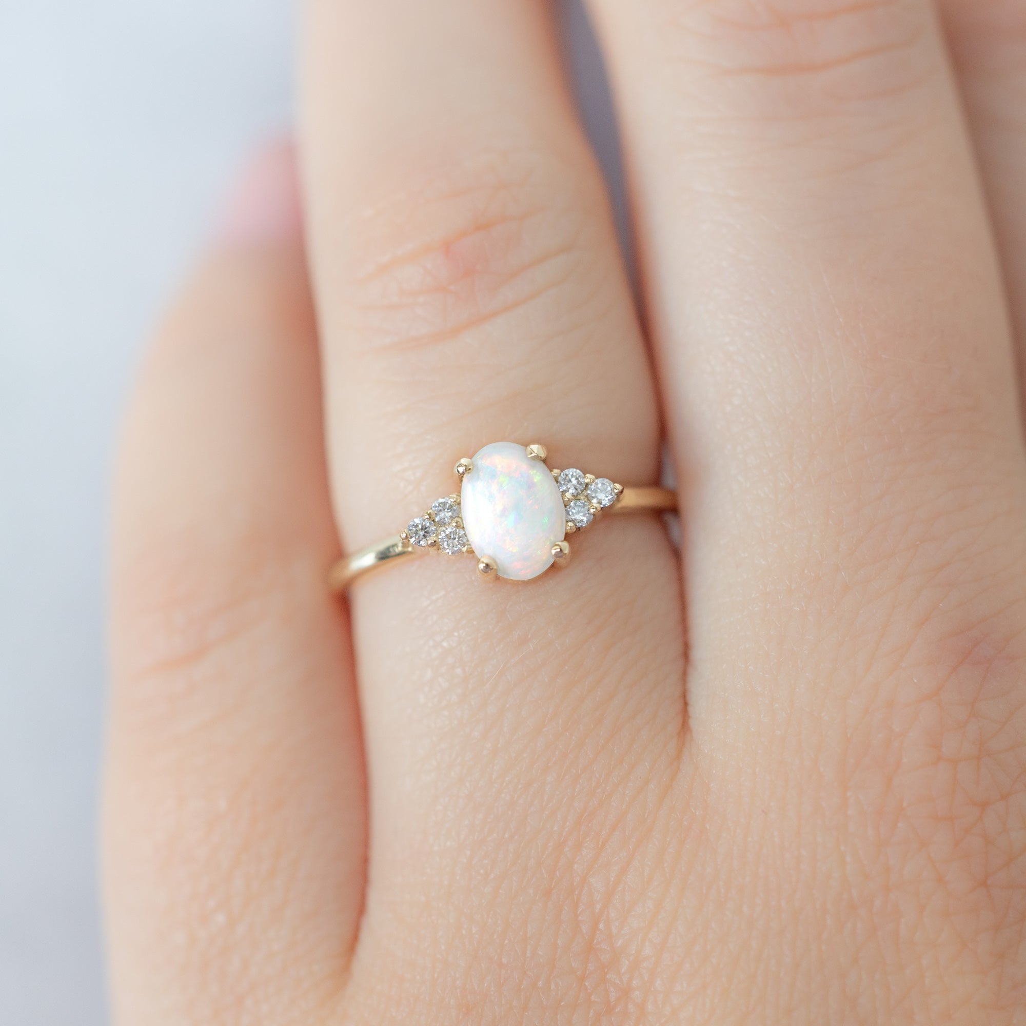 The Ivy Ring with a 0.44ct Oval Australian Opal in 14K Yellow Gold  on Model