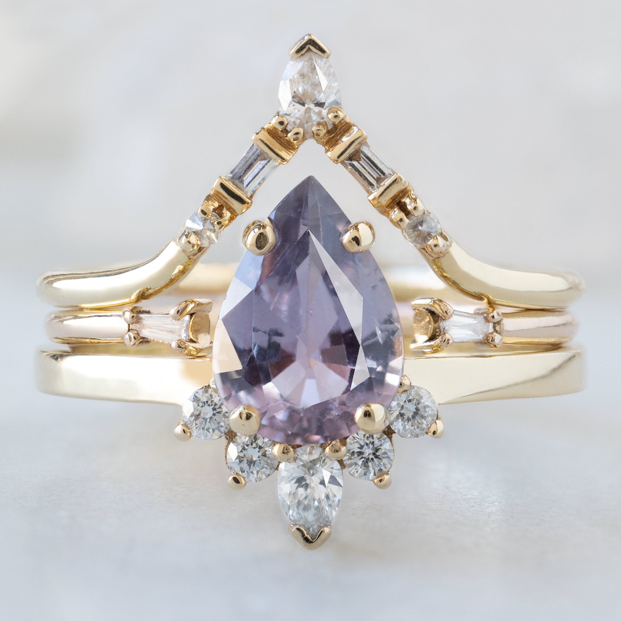 buy:white-diamond-tiara-stacking-band-14k-or-18k-yellow-gold,open-cuff-baguette-white-diamond-stacking-band-14k-or-18k-yellow-gold,the-aster-ring-1-06ct-pear-purple-sapphire-in-14k-yellow-gold
