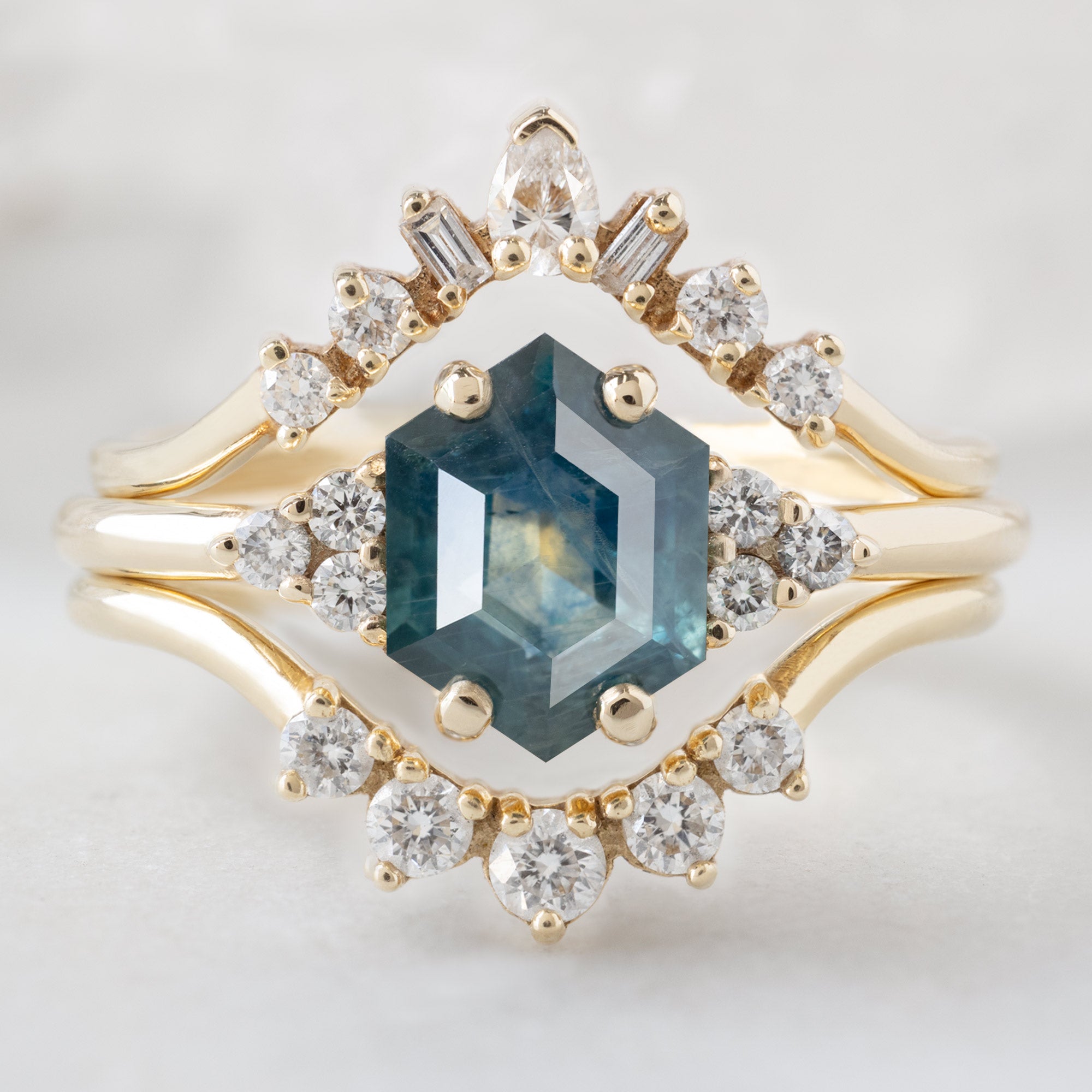 buy:geometric-white-diamond-sunburst-stacking-band-14k-or-18k-yellow-gold,the-ivy-ring-1-22ct-hexagon-blue-sapphire-in-14k-yellow-gold,round-white-diamond-sunburst-stacking-band-14k-or-18k-yellow-gold