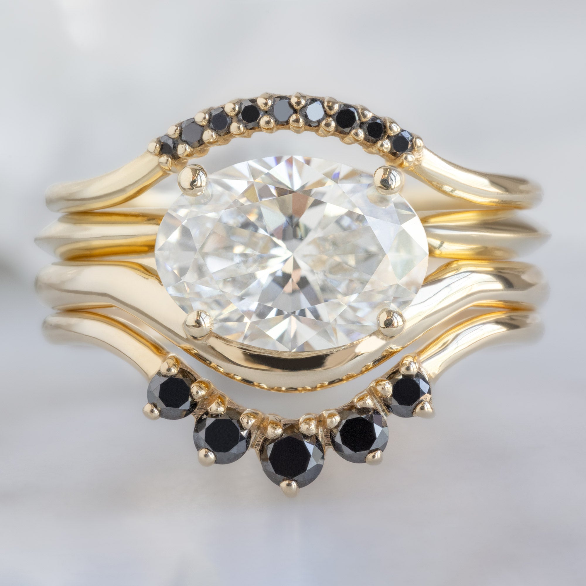 buy:black-diamond-pave-arc-stacking-band-14k-or-18k-rose-gold,gold-open-cuff-knife-edge-stacking-band-14k-yellow-gold,the-wave-ring-1-59ct-oval-lab-grown-white-diamond-in-14k-yellow-gold,round-black-diamond-sunburst-stacking-band-14k-or-18k-rose-gold