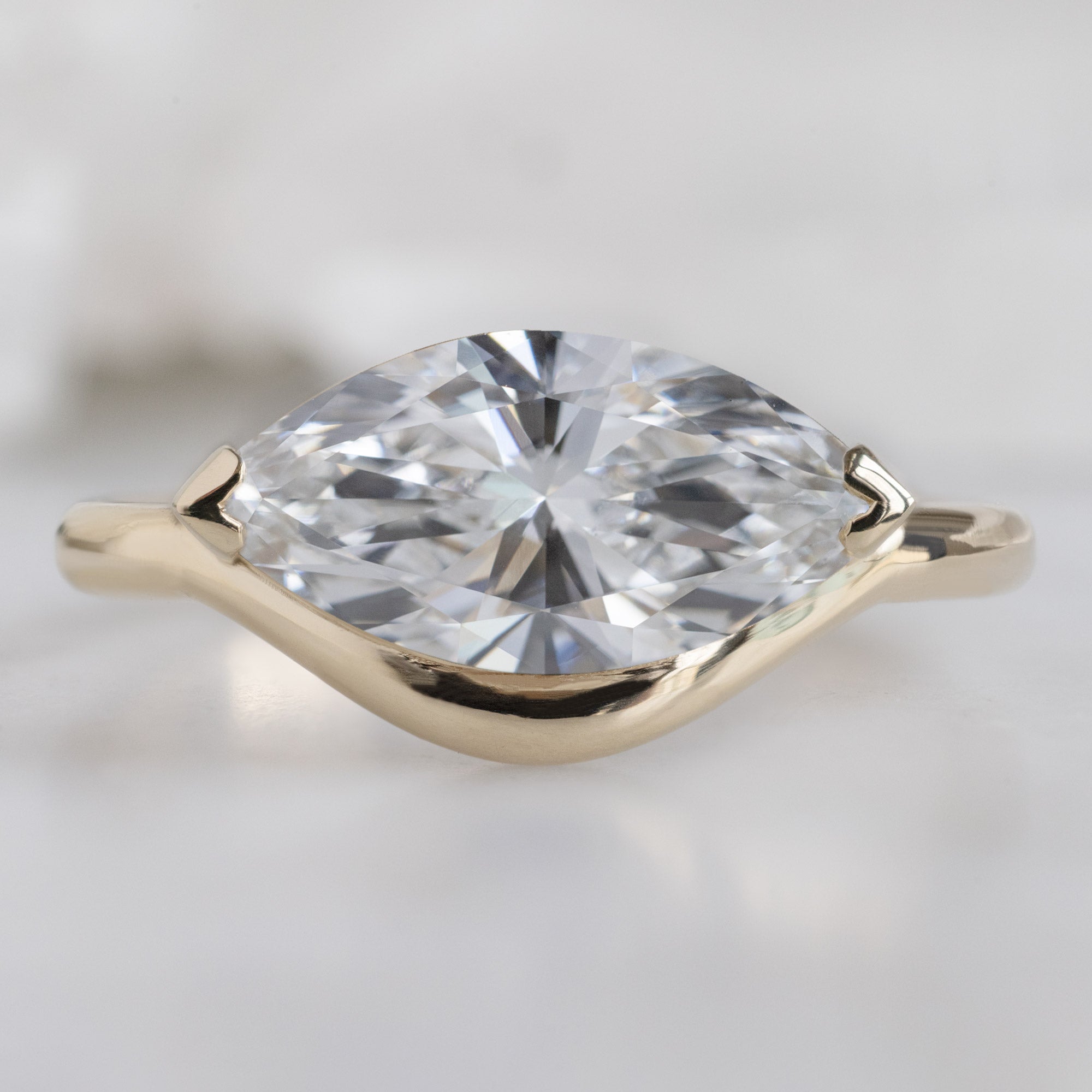 The Wave Ring with a 1.50ct Marquise Lab Grown White Diamond in 14K Yellow Gold